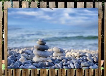 Wallario Sichtschutzzaunmatten Steinstapel am Strand