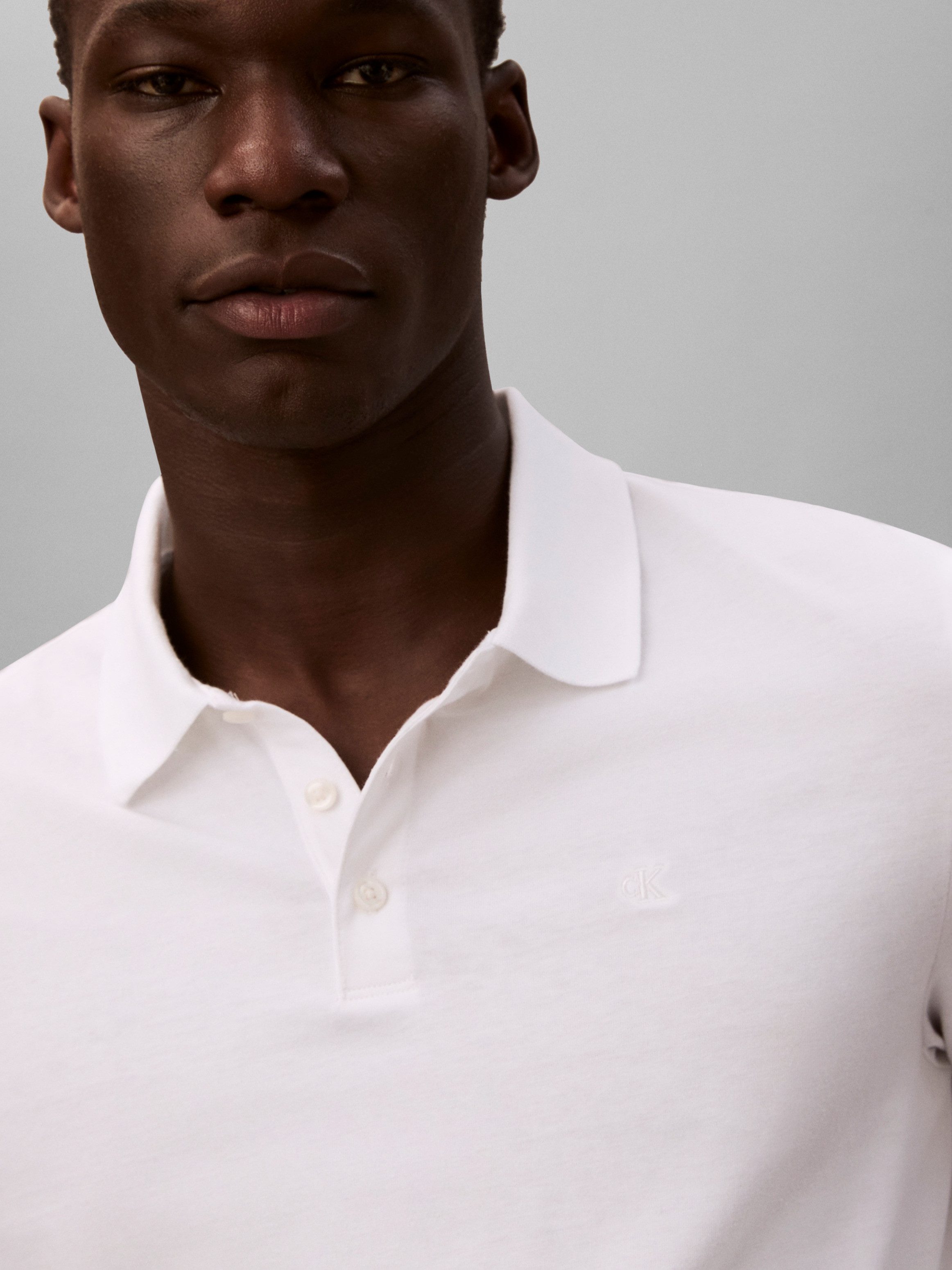 Calvin Klein Jeans Poloshirt CLASSIC MONOGRAM normale Passform, basic, Logostickerei – Bild 4 von 5