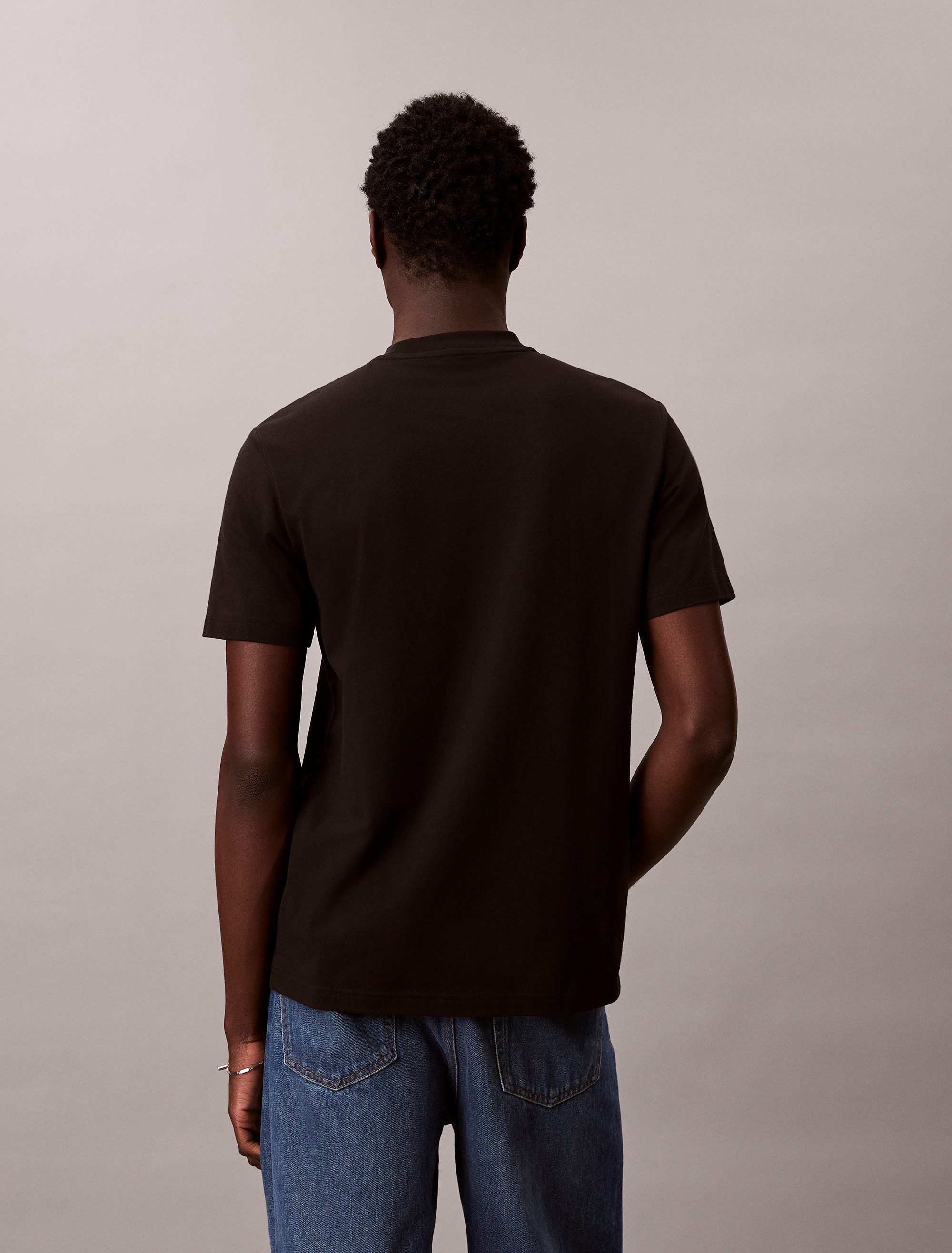 Calvin Klein Jeans T-Shirt Rundhalsausschnitt, Regular Fit, Logoschriftzug – Bild 2 von 5