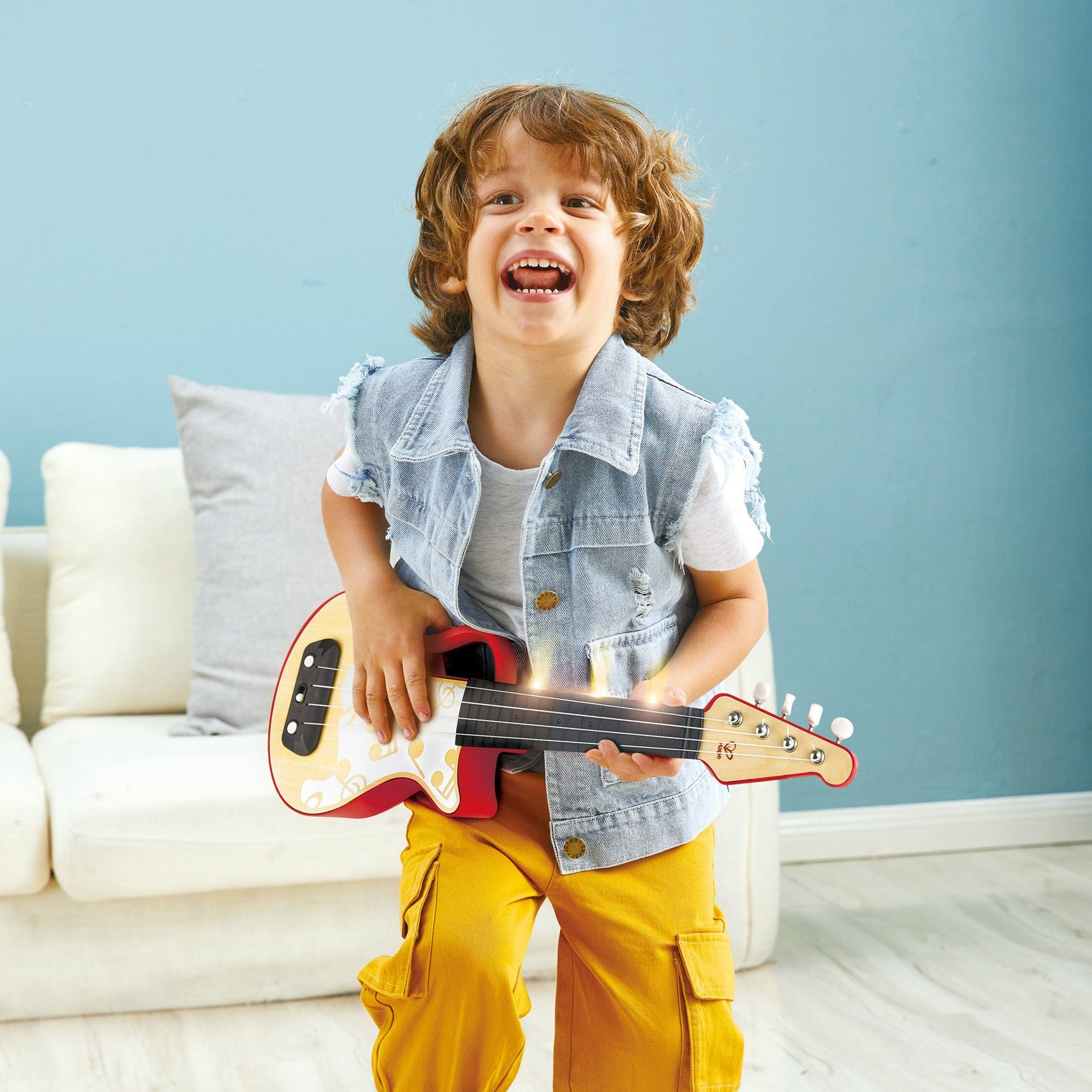 Hape Spielzeug-Musikinstrument Elektrische Lern-Ukulele, rot günstig online kaufen