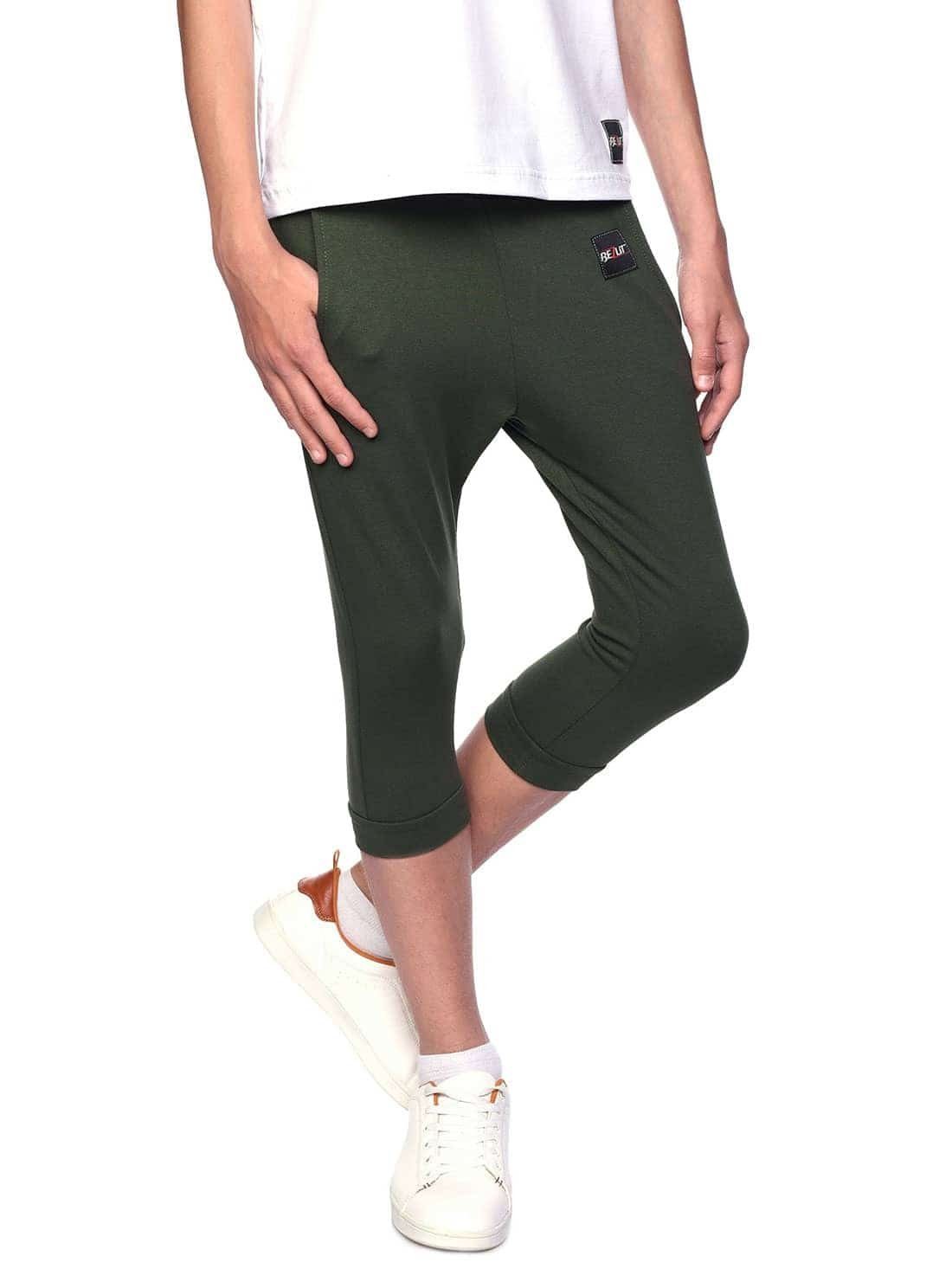 Shorts mit Stoff Strandshorts Kinder Jungen (1-tlg) elastischem BEZLIT Bund Capri Olivegrün