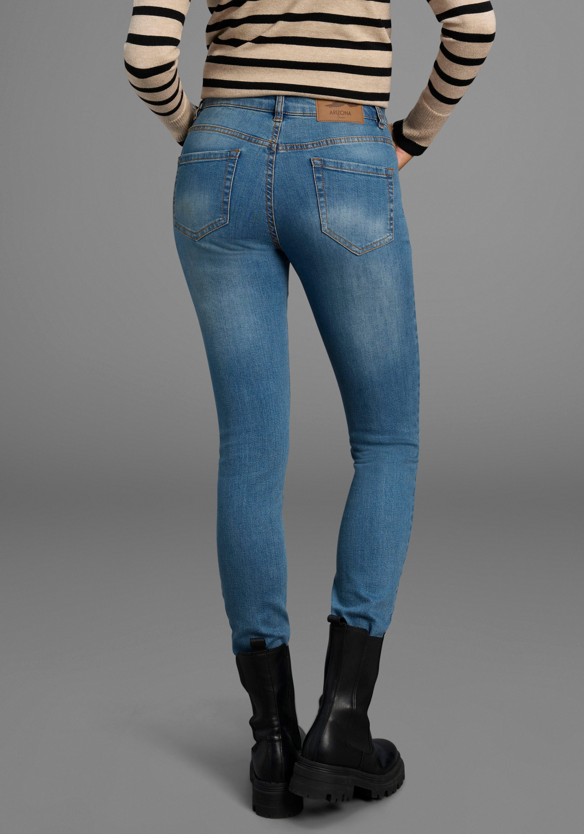 Arizona Slim-fit-Jeans Bund mit seitlichem Gummizugeinsatz schmale Passform, Röhrenjeans, Used-Waschung, hohe Leibhöhe