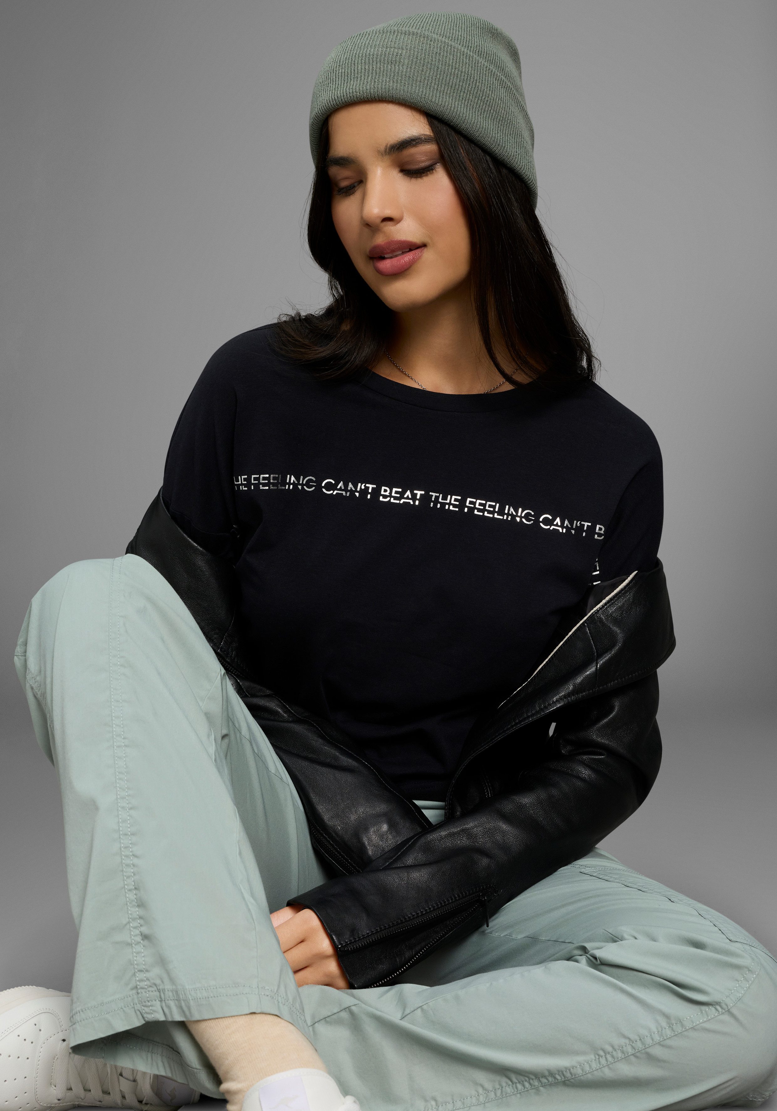 KangaROOS Langarmshirt mit schimmerndem Druck günstig online kaufen