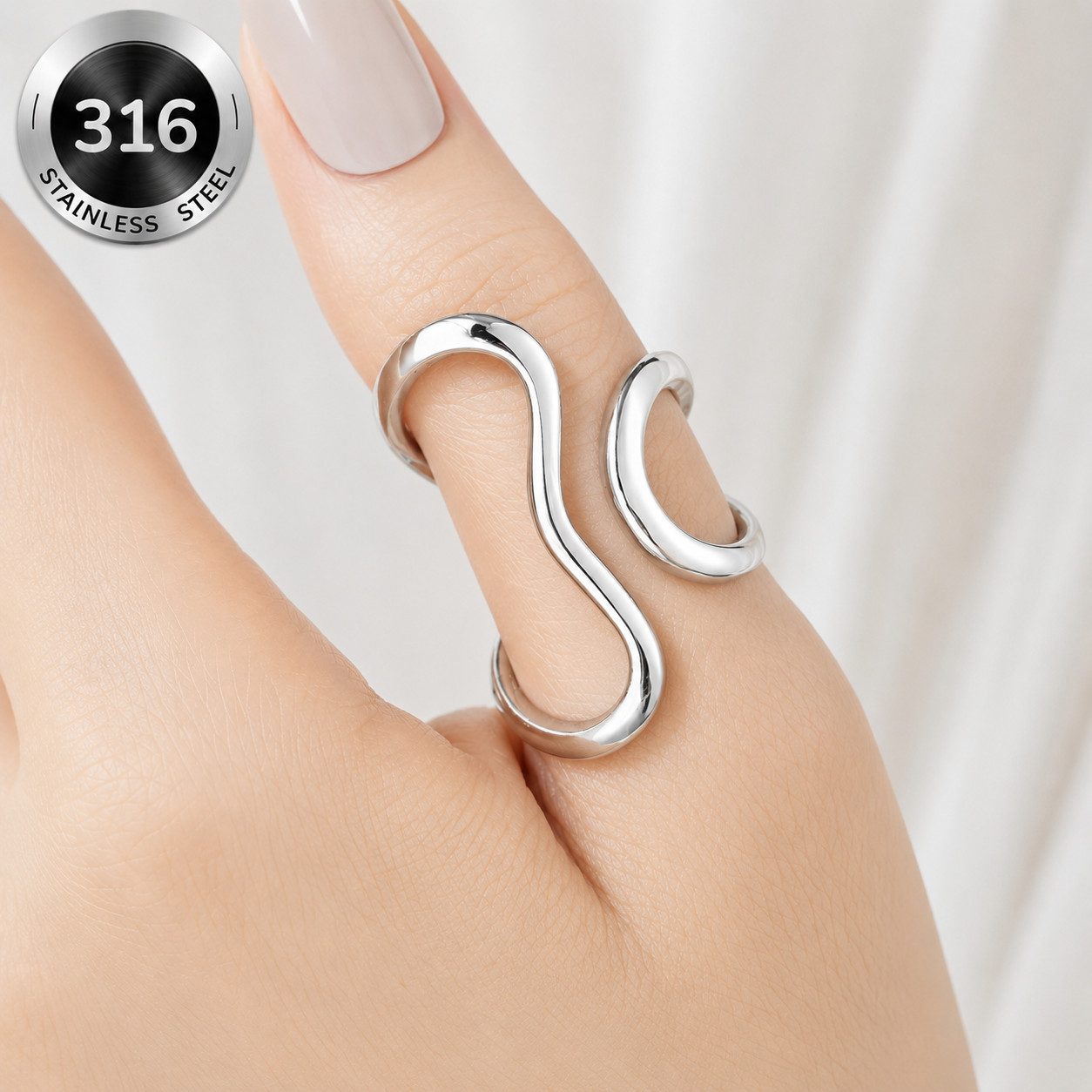 XCOAST Fingerring Wave Ring Damen Silber – Verstellbarer Edelstahl Ring im Wellen-Design (inkl. Schmuckkästchen, 1-tlg., einzeln), verstellbar (anpassbar an verschiedene Fingergrößen)