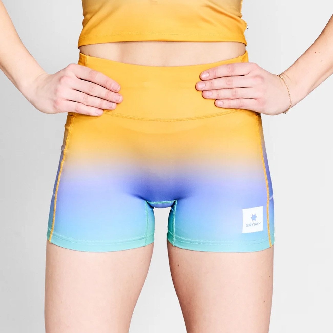 Saysky Laufhose Saysky W Drip Dye Combat+ Short Tights 4" Purple AOP