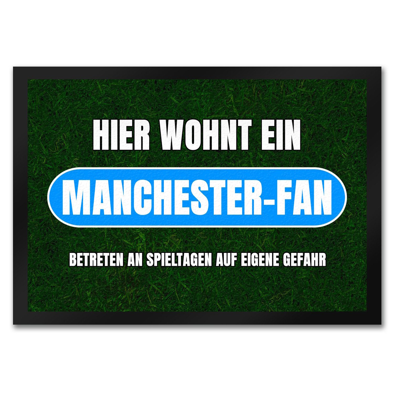 Fußmatte Hier wohnt ein Manchester-Fan Fußmatte in 35x50 cm mit Rasenmotiv