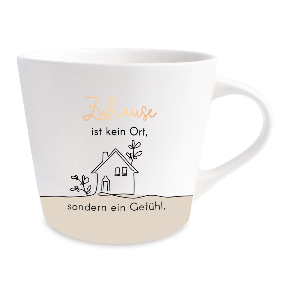 Grafik Werkstatt Tasse Goldtasse "Zuhause ist kein Ort, sondern ein Gefühl", nicht für die Mikrowelle geeignet
