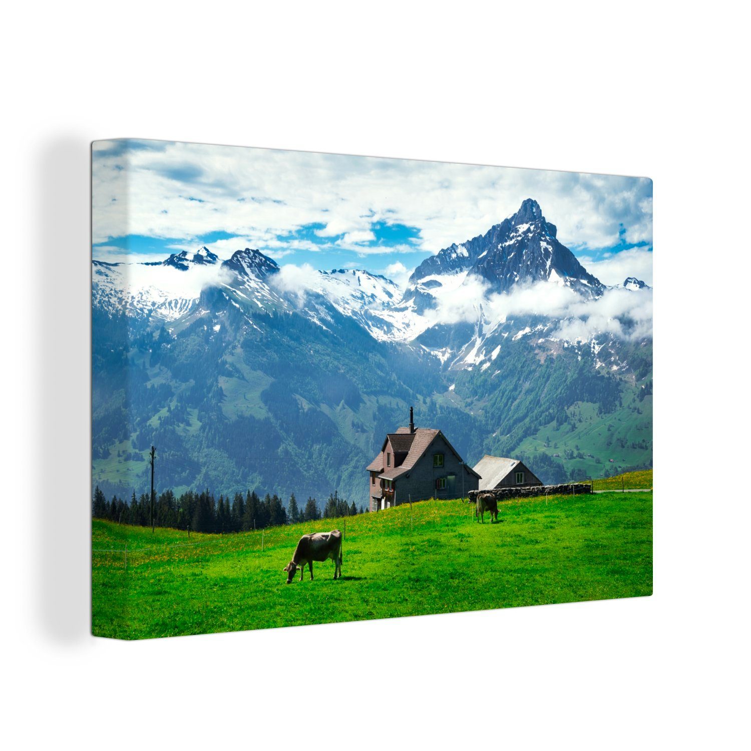 OneMillionCanvasses® Leinwandbild (1 Leinwandbilder, Alpen, Wandbild Wanddeko, Haus 30x20 cm - - St), Kuh Aufhängefertig