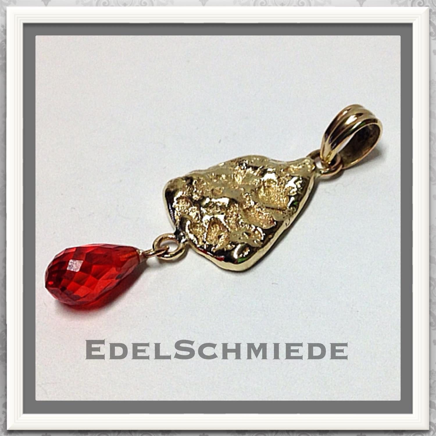 Schmuckset Nuggetanhänger 333/- Gelbgold mit rotem Zirkonia
