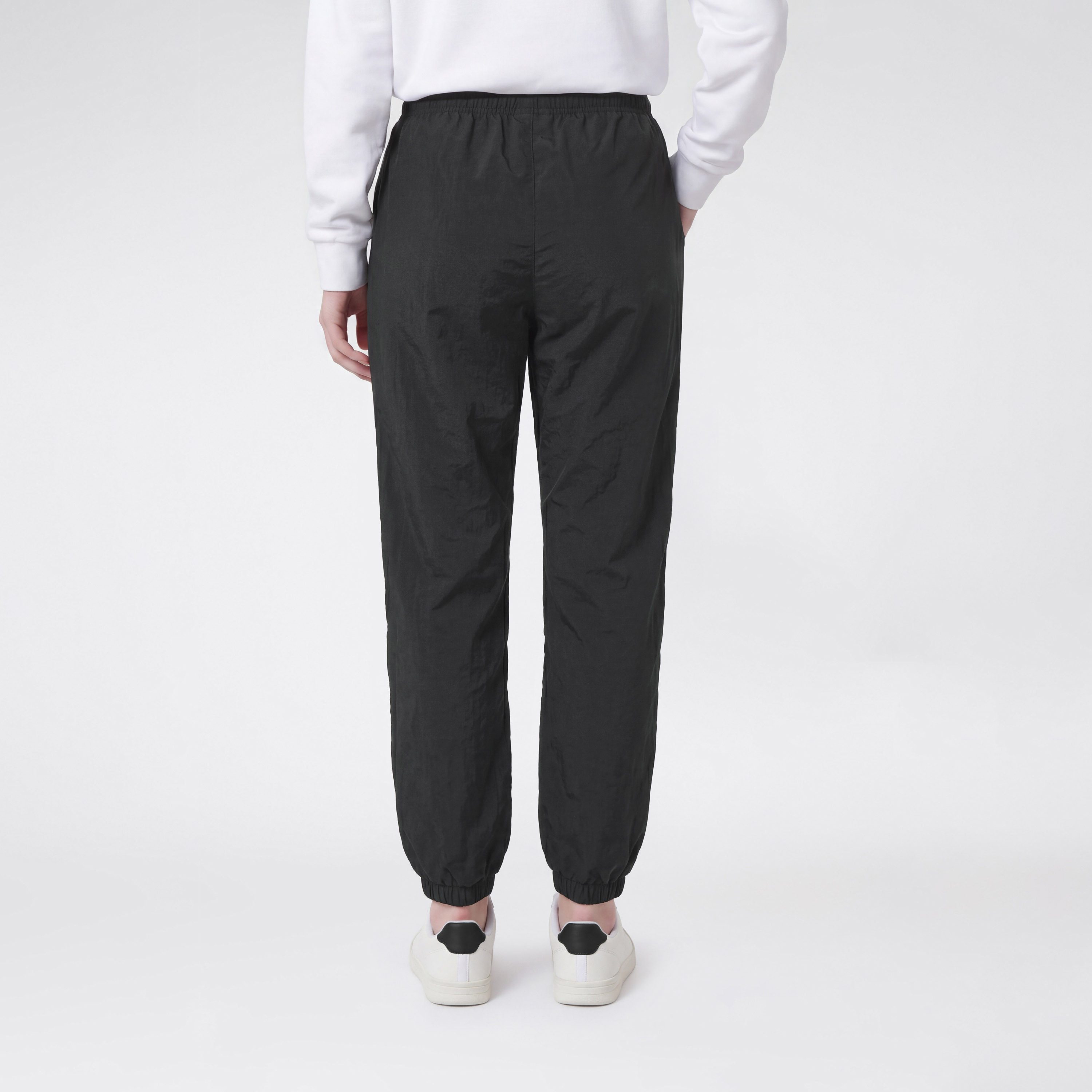 Champion Trainingshose SPORTWEAR CUFFED PANTS Loose Fit Nylon Loose Fit, aus Polyamid, mit Cuffed-Design, auch in großen Größen