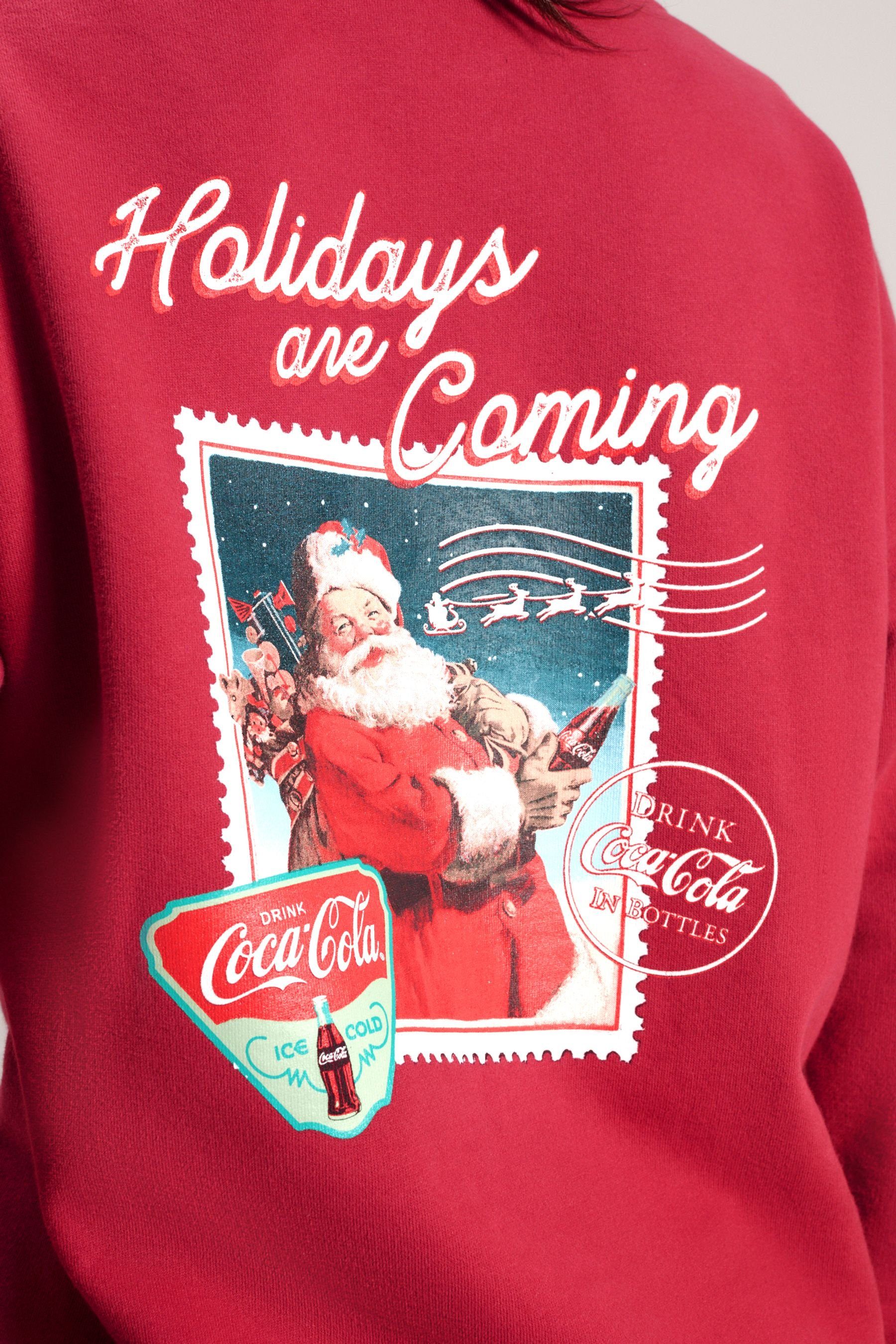 Weihnachtspullover Sweatshirt Coca-Cola Lizenzierter (1-tlg) Next