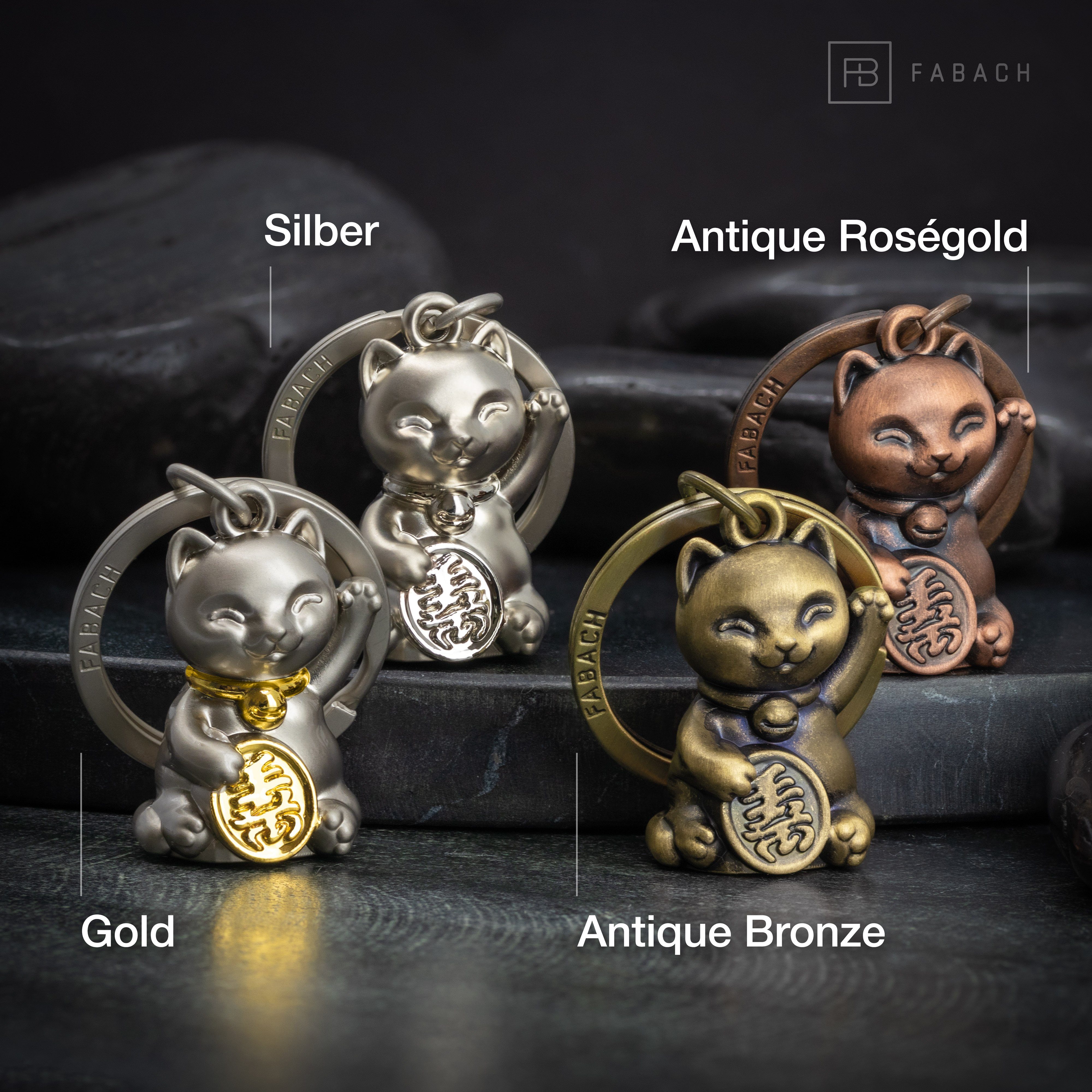 FABACH Schlüsselanhänger Glückskatze Maneki Neko - Winkekatze Glücksbringer Geschenk