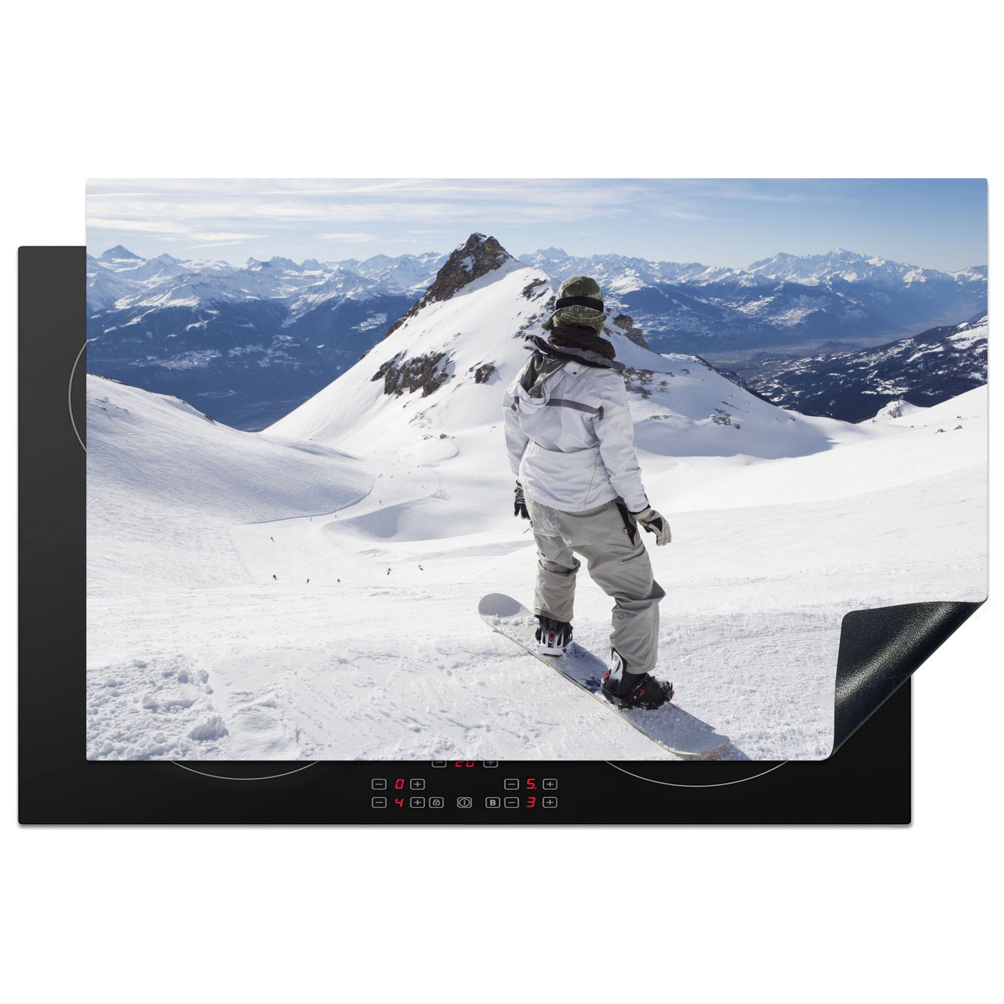 MuchoWow Herdblende-/Abdeckplatte Ein Snowboarder blickt auf die schneebedeckten Berge, Vinyl, (1 tlg), 81x52 cm, Induktionskochfeld Schutz für die küche, Ceranfeldabdeckung