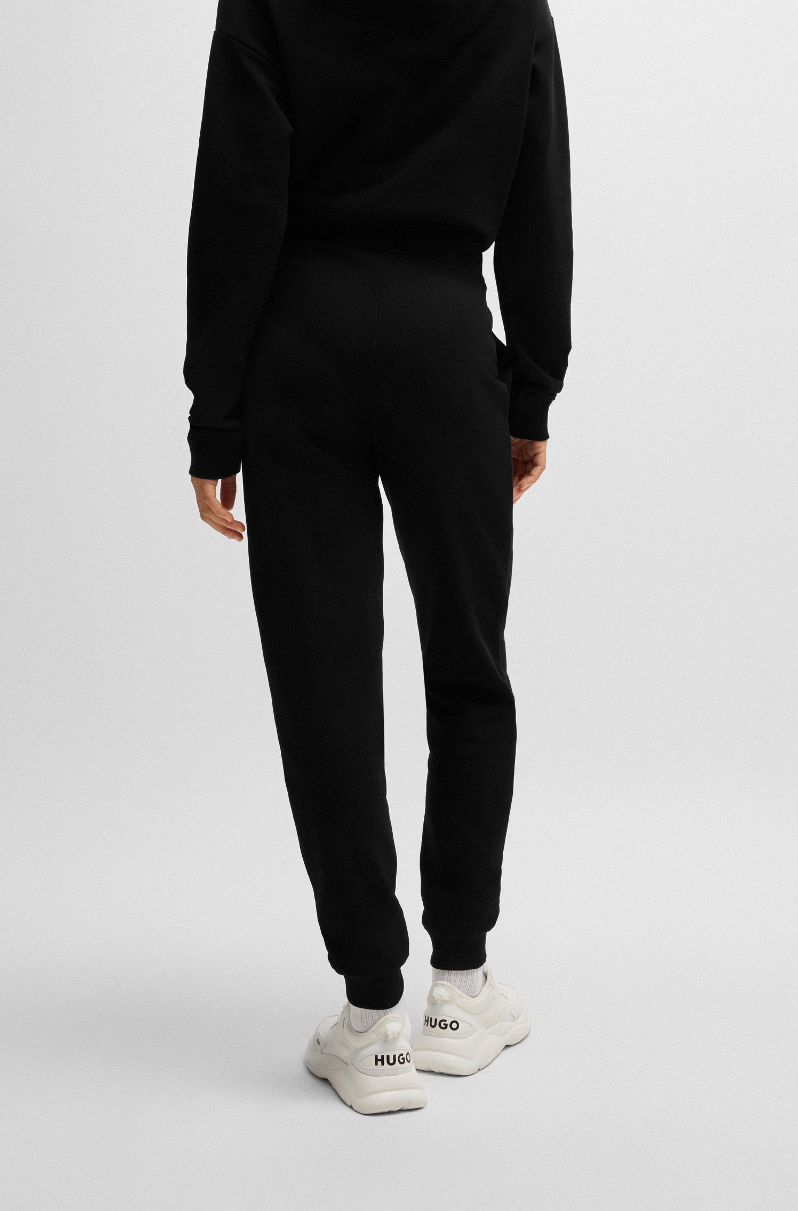 HUGO Jogginghose Nelfinia mit Logo-Stickerei (1-tlg)