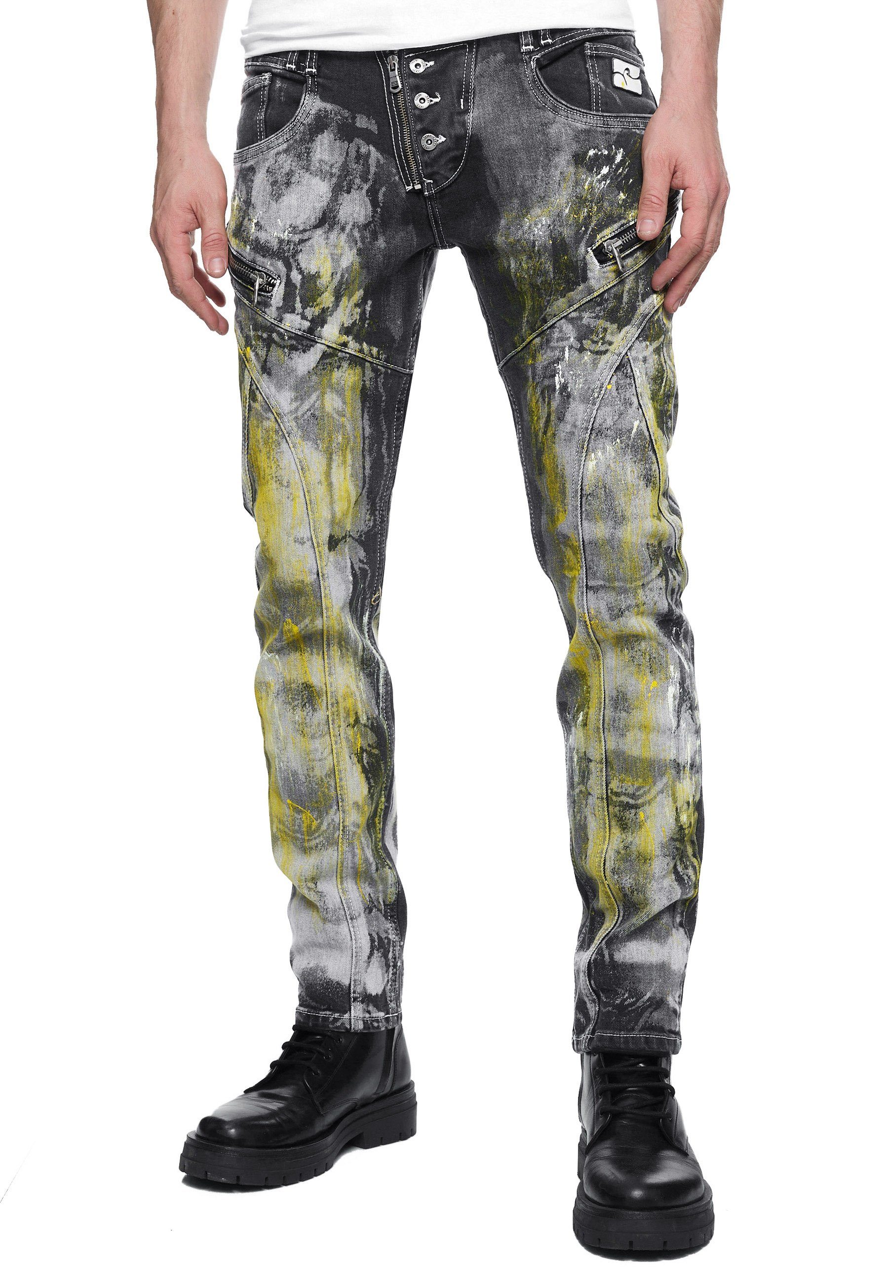 Rusty Neal Straight-Jeans MORI mit trendigen Zierelementen schwarz-gelb