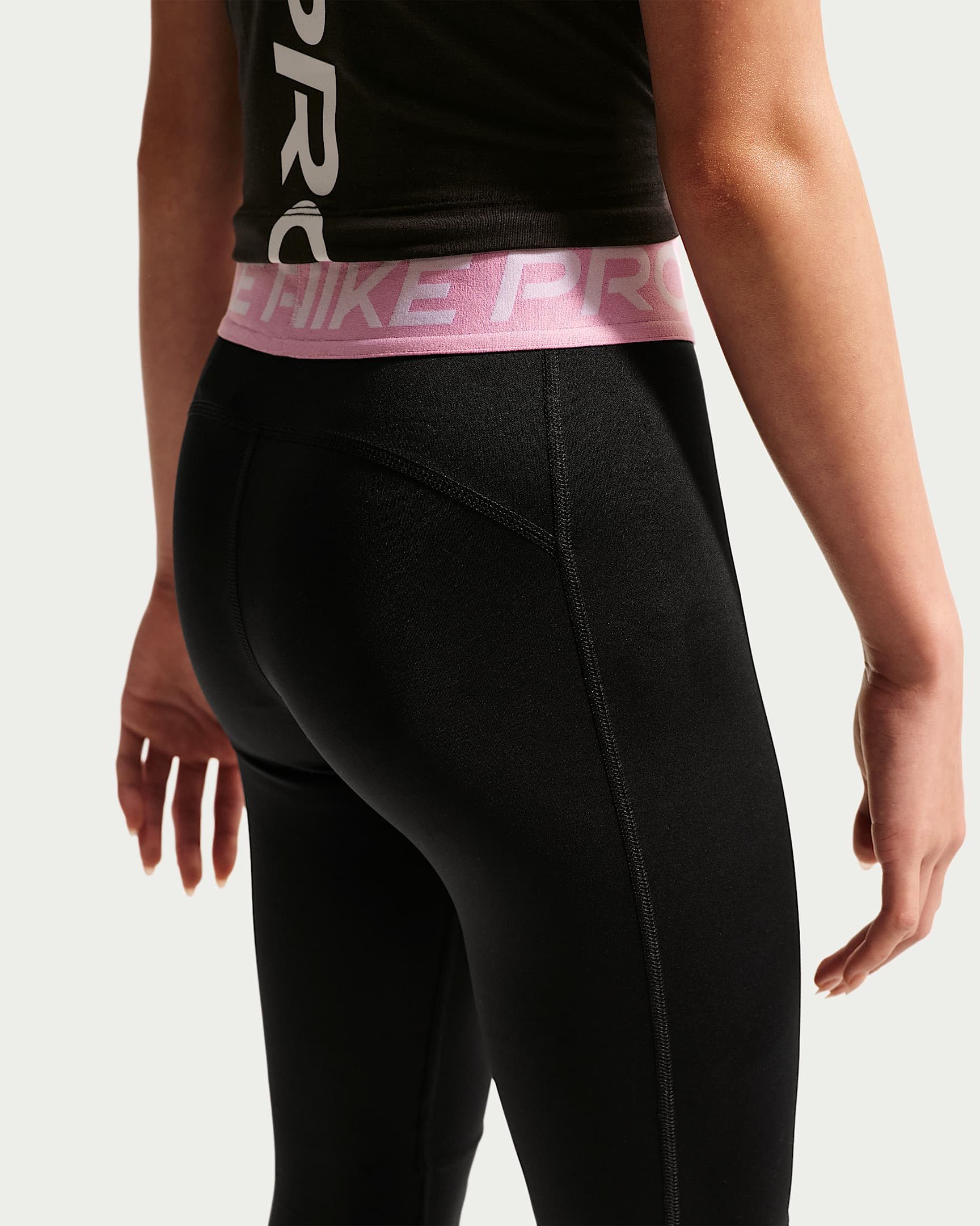 Nike Leggings G NP LEGGING mit Logodruck und Logoschriftzügen, besonders elastische Passform