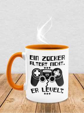 Shirtracer Tasse Ein Zocker altert nicht - er levelt, Keramik, Statement Sprüche