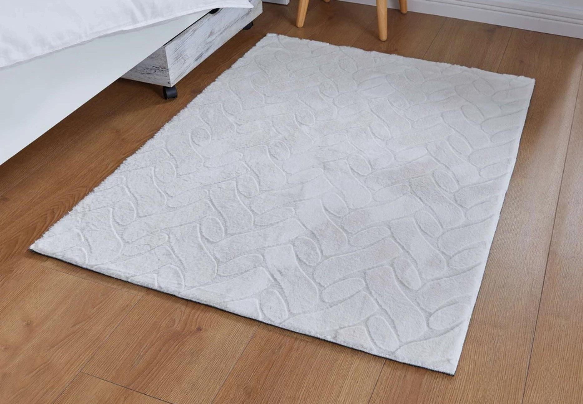 Dekoleidenschaft Fellteppich "Luxus" aus Kunstfell in offwhite, 90x120 cm, Teppich für Wohnzimmer, rechteckig, Schlafzimmer & Bad, rutschfest, Teppichläufer waschbar, Bettvorleger