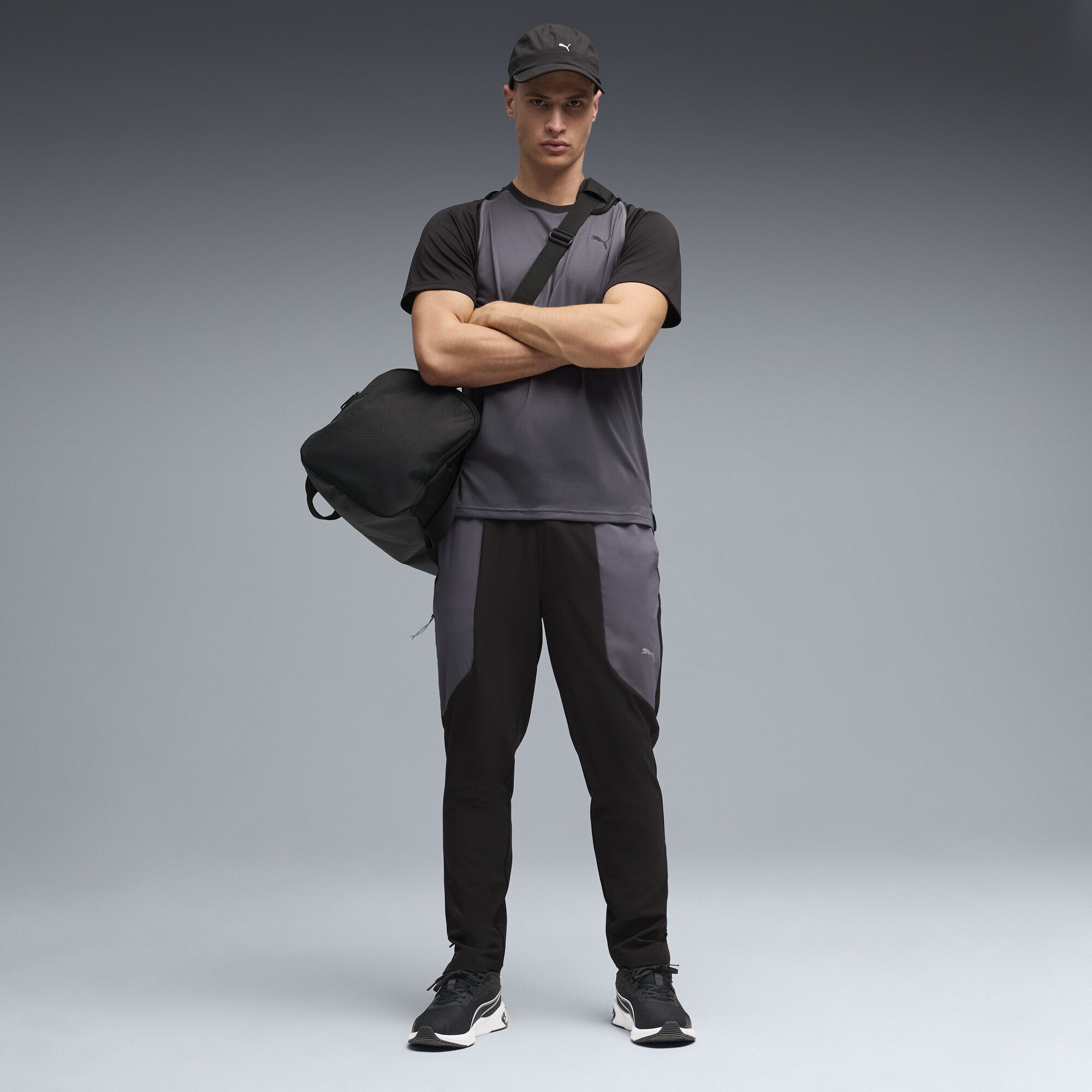 PUMA Trainingshose FLEX STRETCH Gewebte Trainingshose Herren