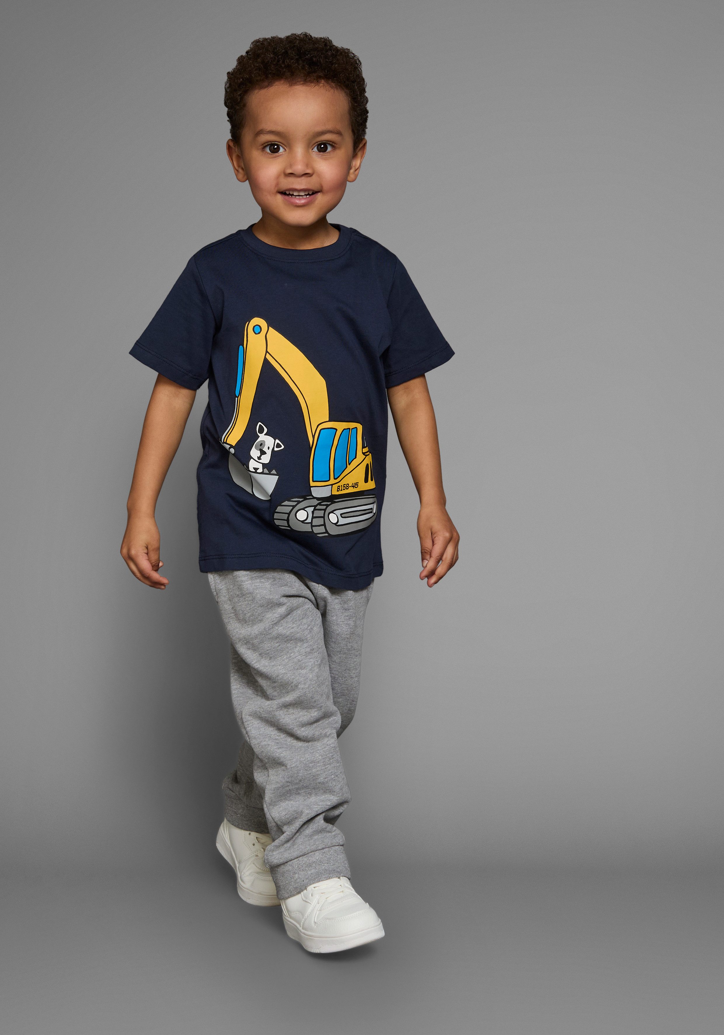 KIDSWORLD T-Shirt Kurzarm, Basic-Passform, mit stylischem Druck, mit Rippbündchen