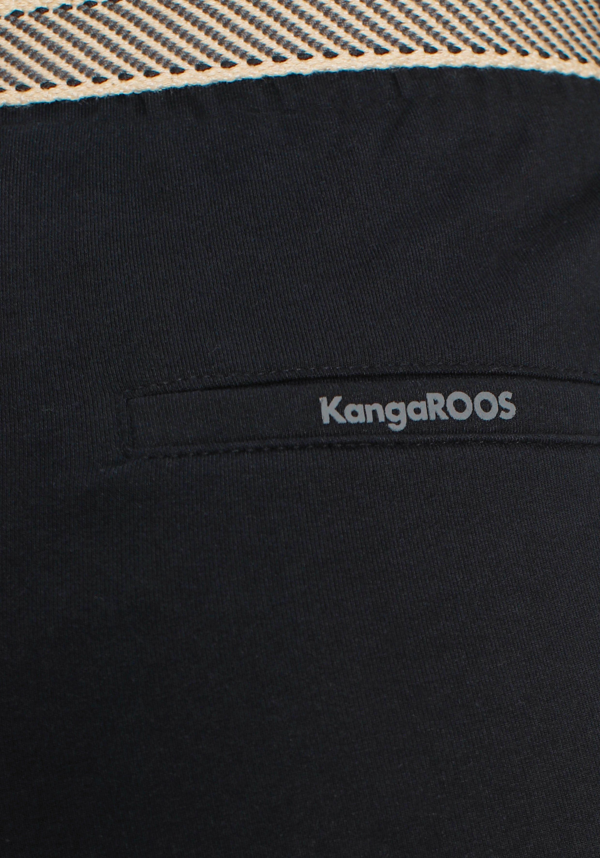 - Pants im (2-tlg., Look Jogger schwarz KOLLEKTION NEUE mit konfektionierten lässigen Gürtel) KangaROOS