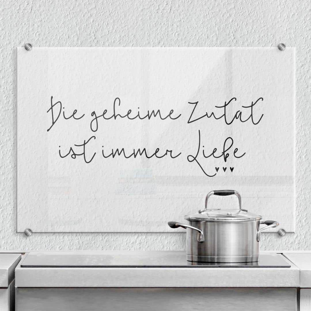 K&L Wall Art Gemälde Spritzschutz Herd Küchenrückwand Klarglas Schriftzug Geheime Zutat, Glas Wandschutz inkl Montagematerial