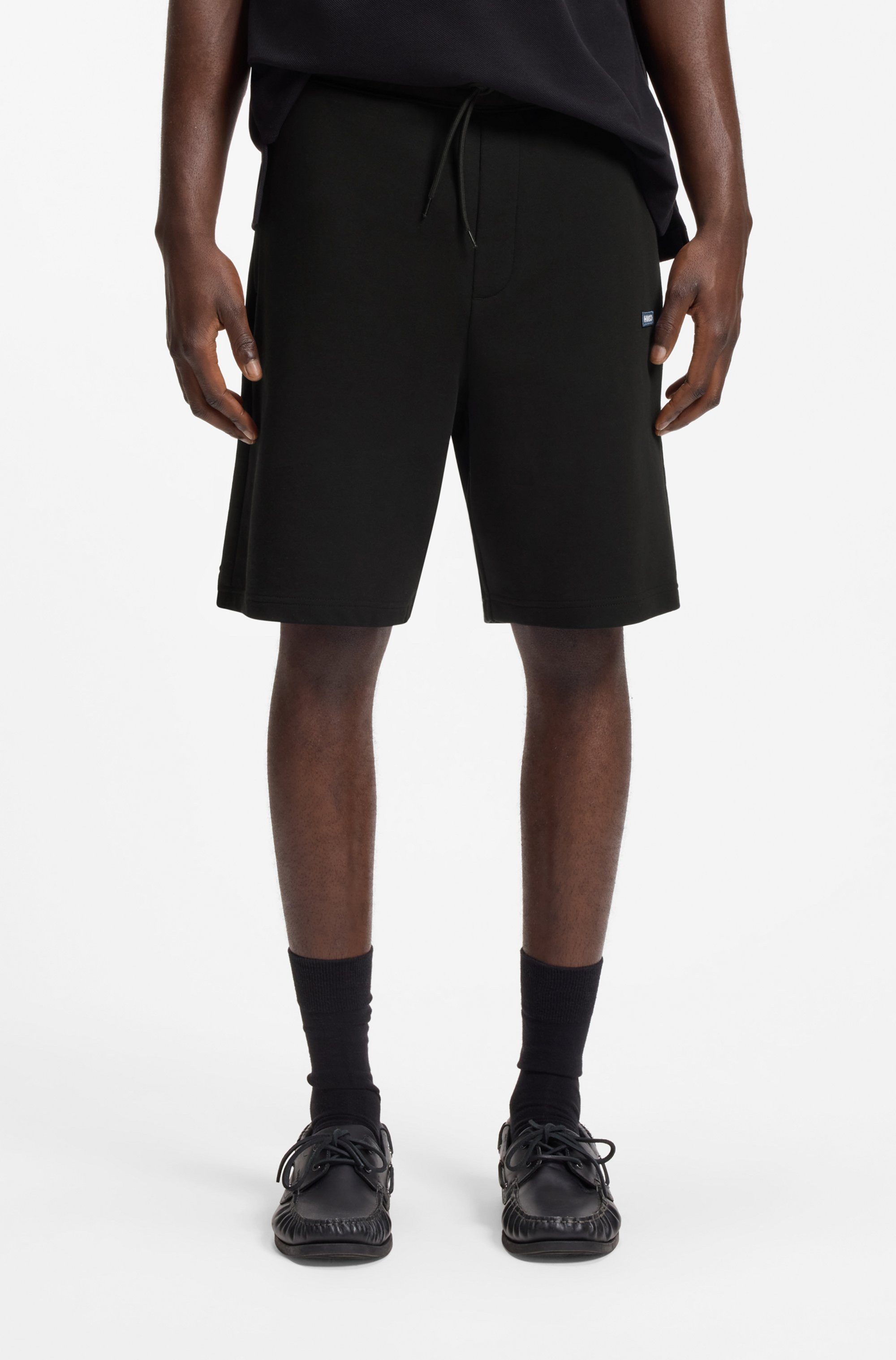 HUGO Blue Sweatshorts Nasensio mit Markenlabel. Reduzierter Preis € 63,99. Unverbindliche Preisempfehlung € 79,95