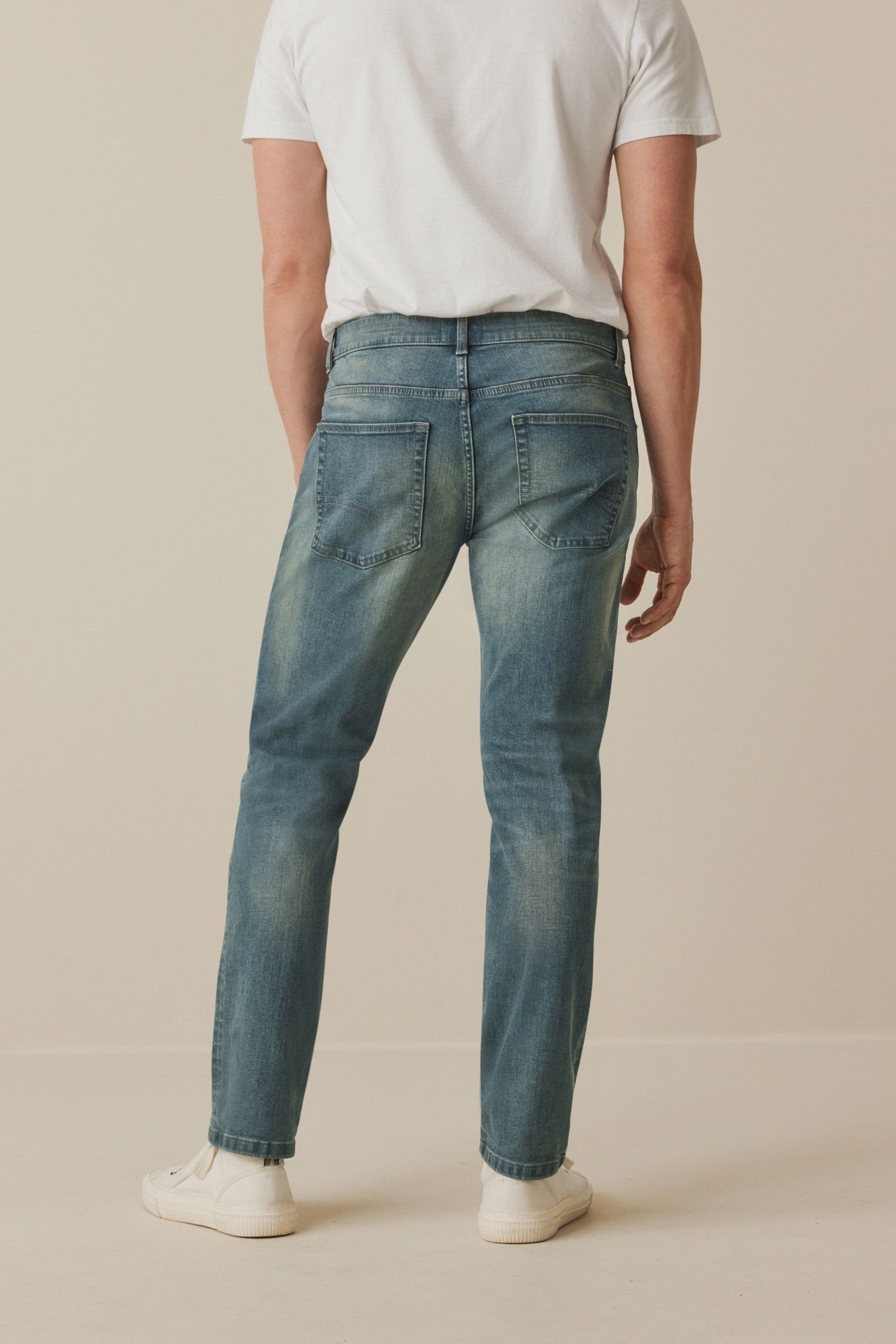 Stretch Blue Slim-fit-Jeans mit Jeans Vintage Tint (1-tlg) Next Fit Essential Slim