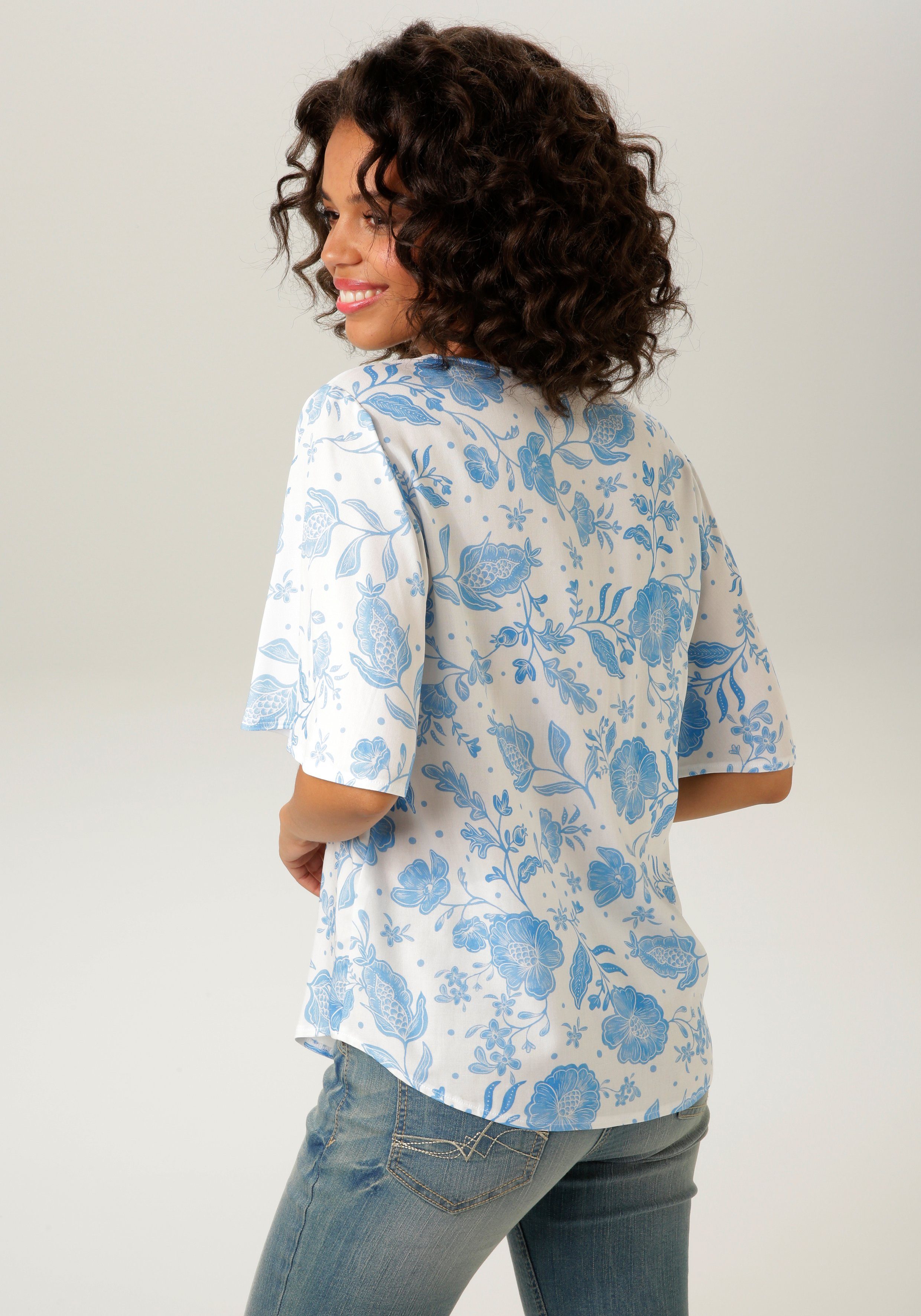 Aniston CASUAL Schlupfbluse mit großflächigem Blumendruck günstig online kaufen