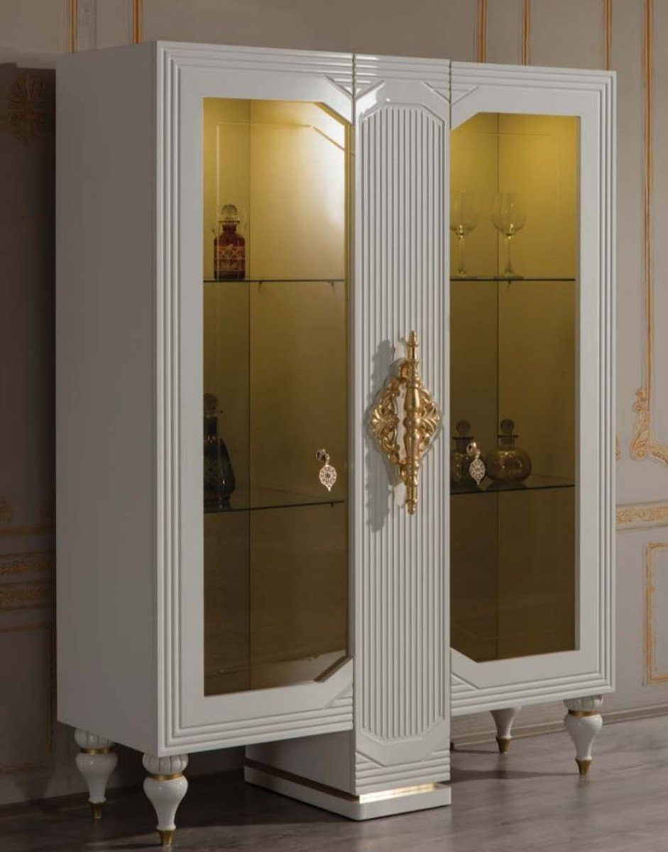Casa Padrino Vitrine Luxus Barock Vitrine Weiß / Gold 125 x 49 x H. 169 cm - Beleuchteter Massivholz Vitrinenschrank mit 2 Glastüren - Edle Barock Möbel