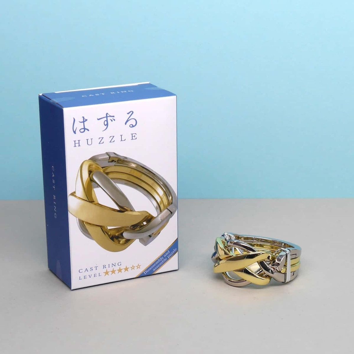 Hanayama Spiel HUZZLE CAST RING - elegantes Puzzle, Denkspiel, Metallpuzzle