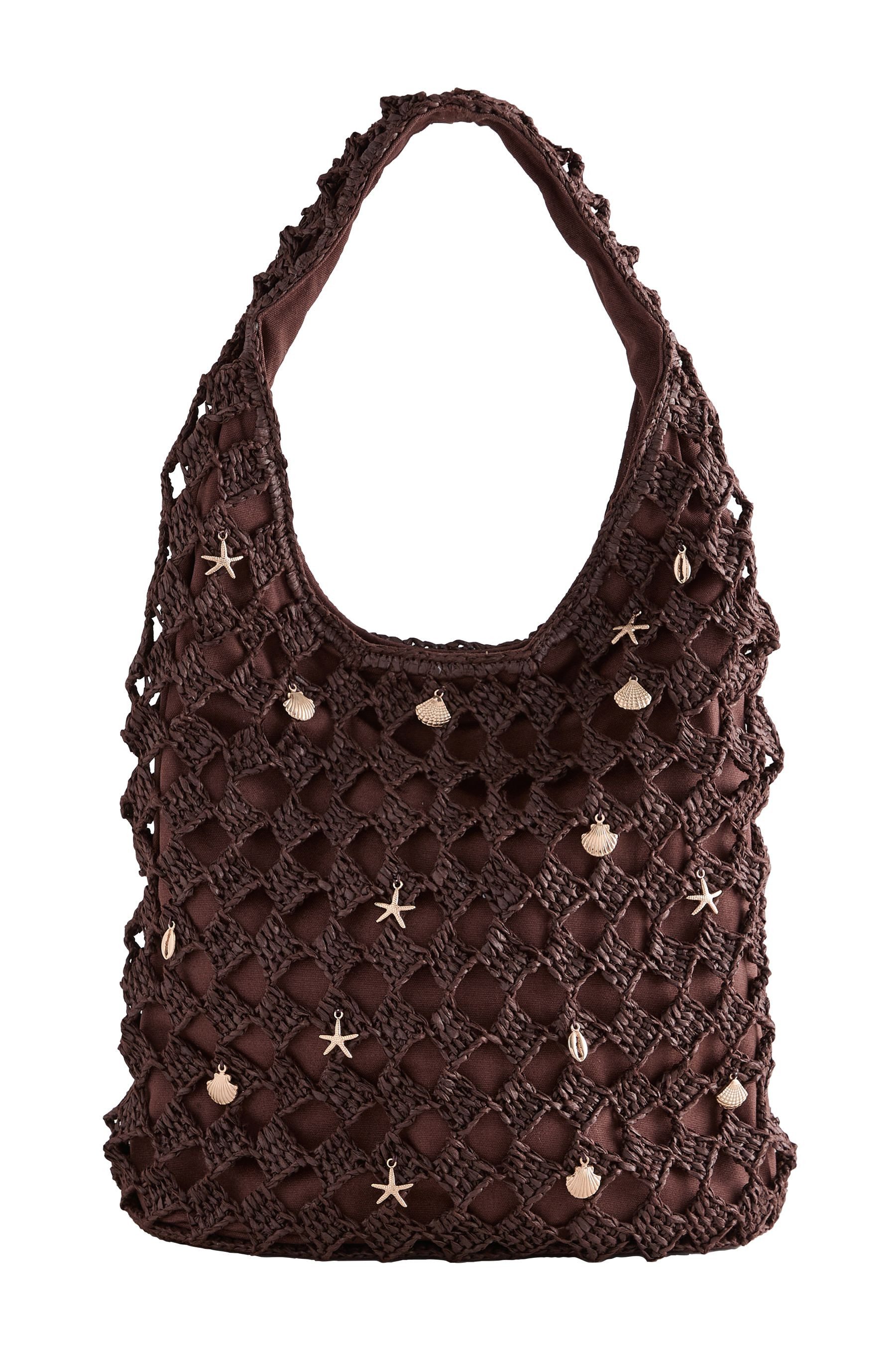 Next Schultertasche Schultertasche in Häkeloptik mit Muschelanhänger (1-tlg)