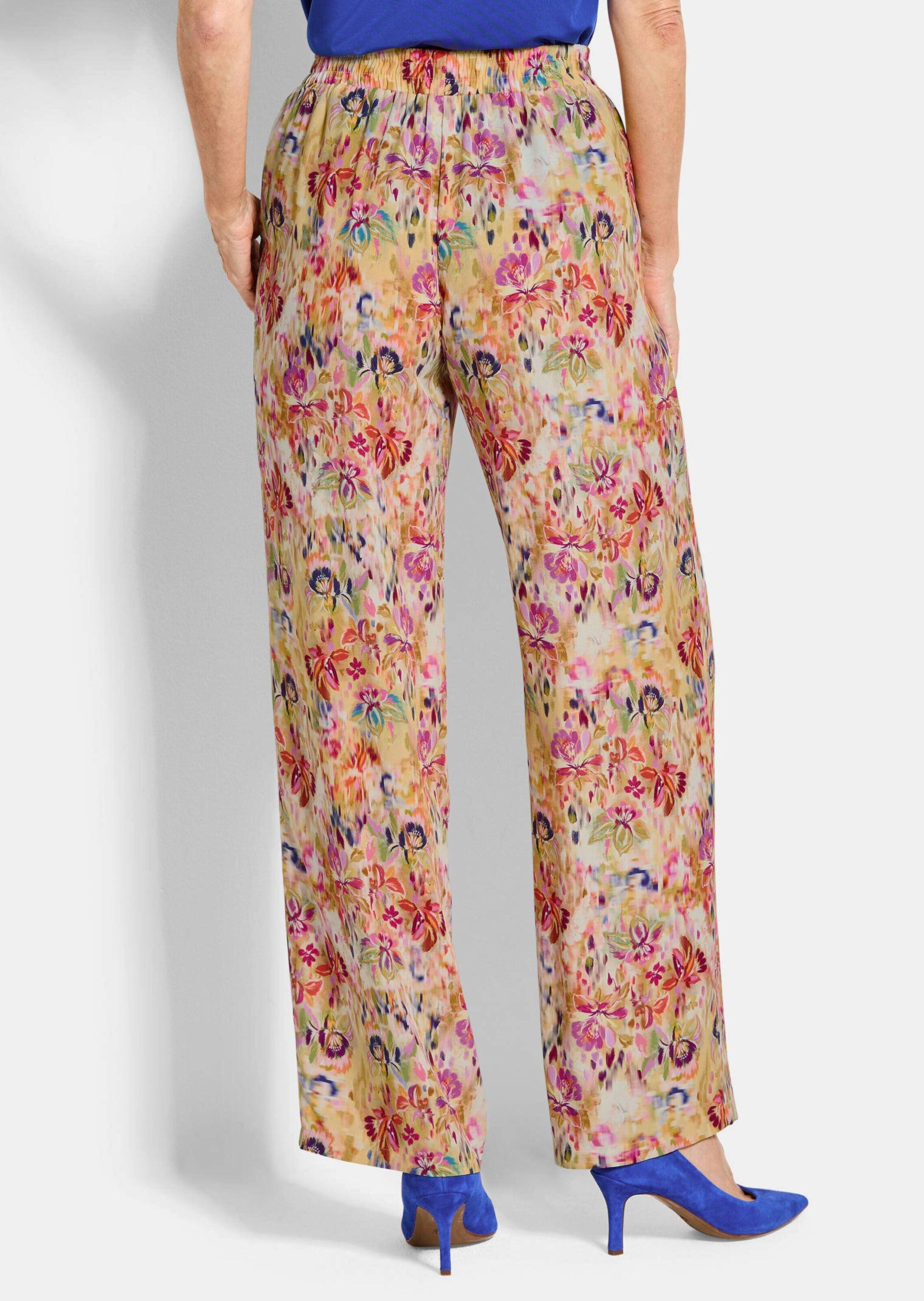 GOLDNER Stoffhose Schlupfhose mit floralem Print Viskosehose mit Teildehnbund, Eingriffstaschen und Knöchellänge