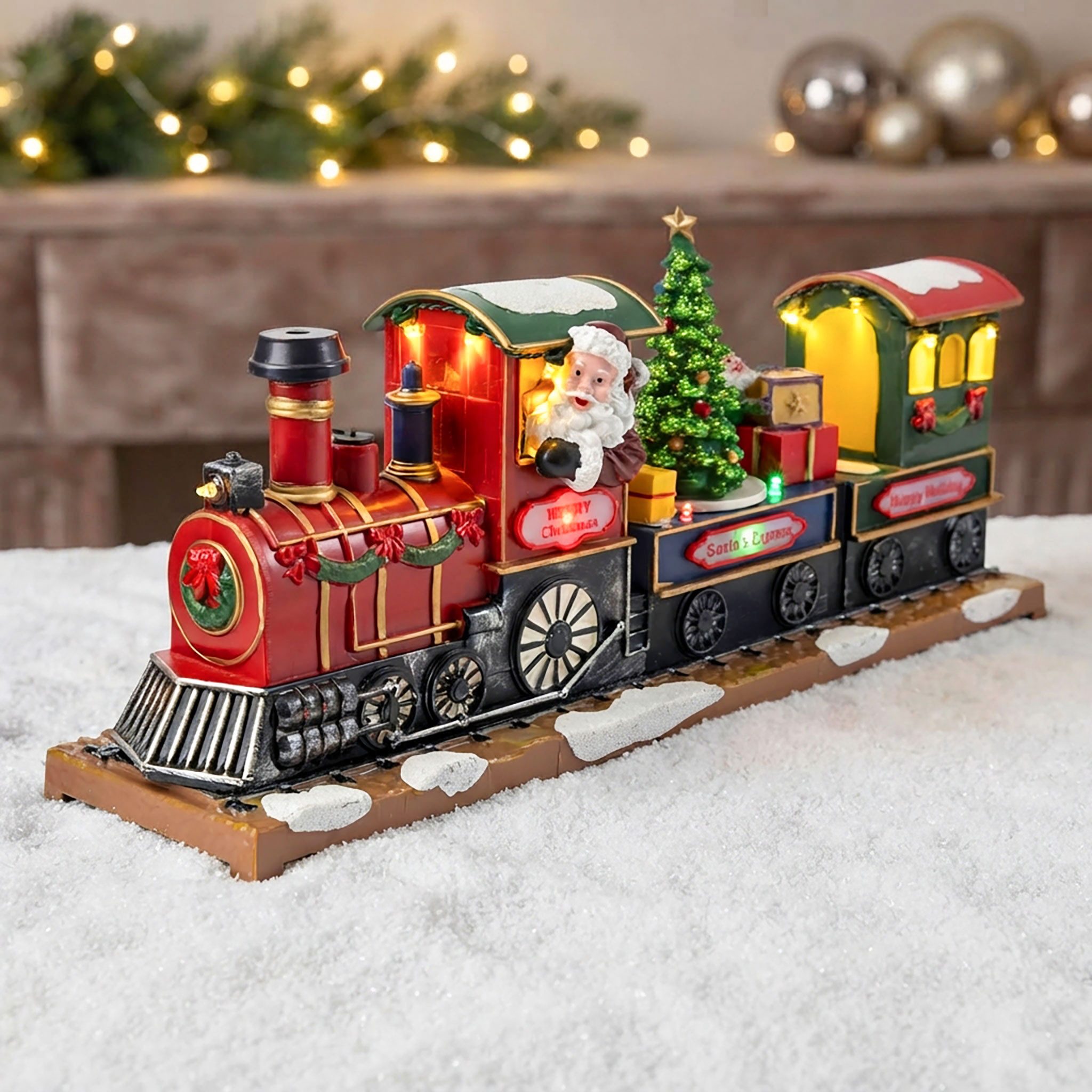 Spetebo Weihnachtsszene LED Zug mit drehendem Tannenbaum - 38 x 17 cm, Winterstadt bunt beleuchtet per Batterie oder Stecker betrieben