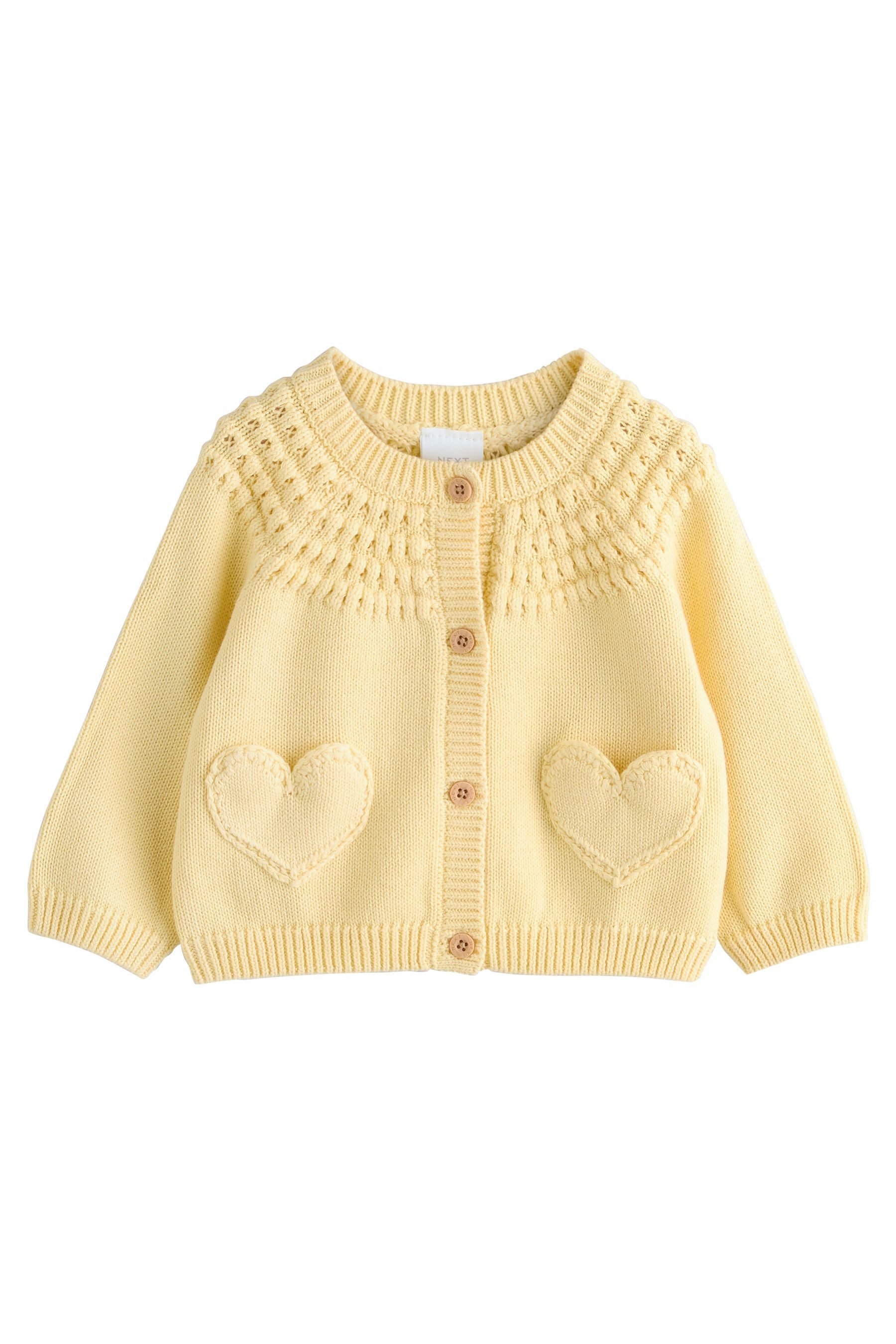 Next Strickjacke Baby Strickjacke mit Knopfleiste, Tasche und Herz (1-tlg)