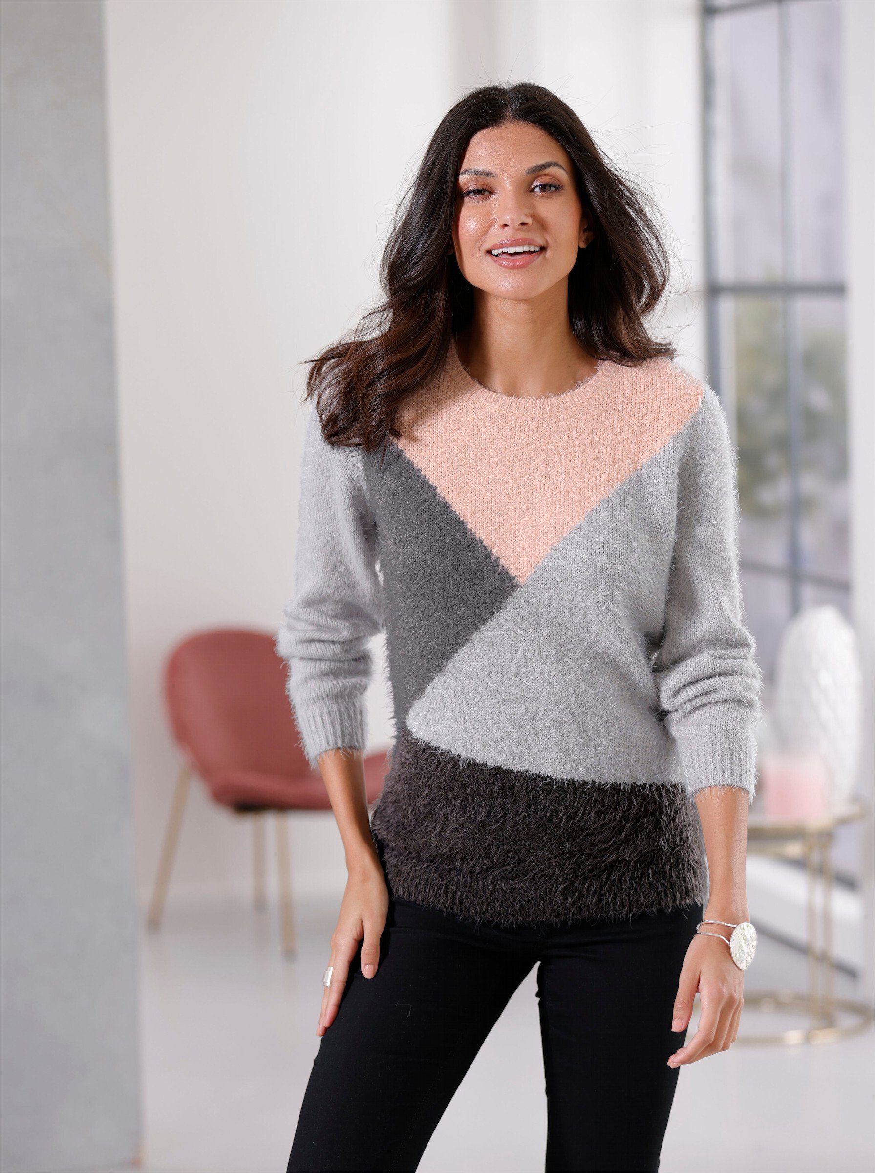 Strickpullover an! Sieh