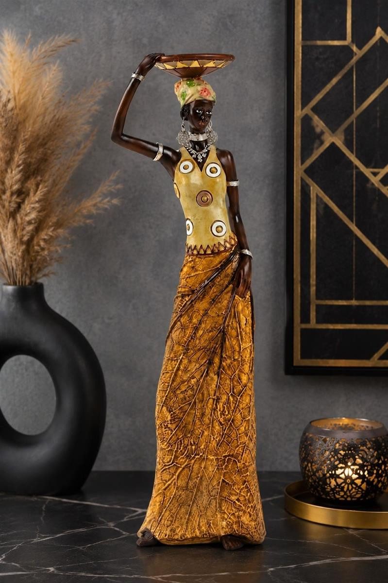 Geschenkestadl Afrikafigur Afrikanische Frau mit Schale, Rock in Blattoptik 35–40 cm Dekofigur (1tlg), Der Rock ist in Blattform gearbeitet – Bild 3 von 3