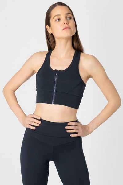 SUPER.NATURAL Sporttop Merino Sport-Top W MOTION ZIP TOP funktioneller Merino-Materialmix