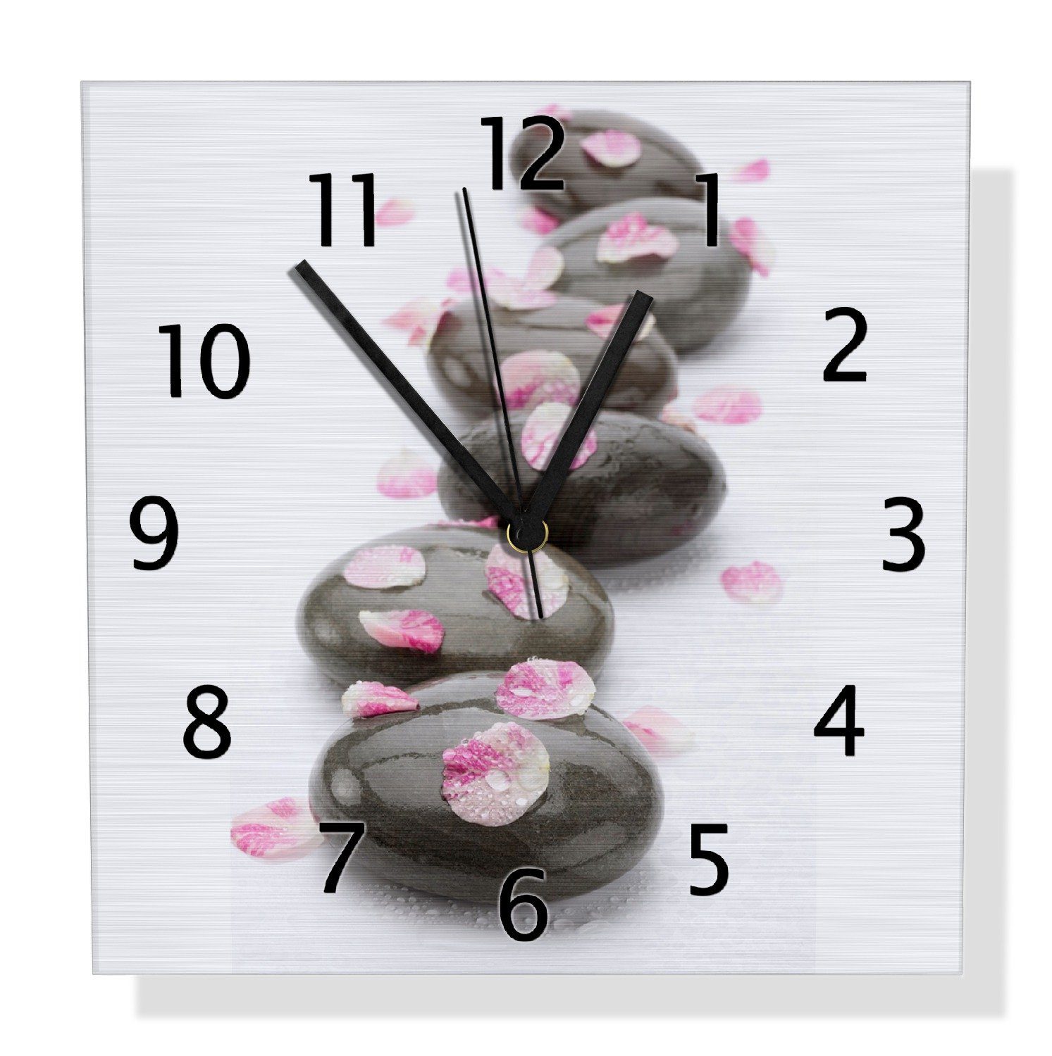 Wanduhr Dunkle Steine mit Blütenblättern