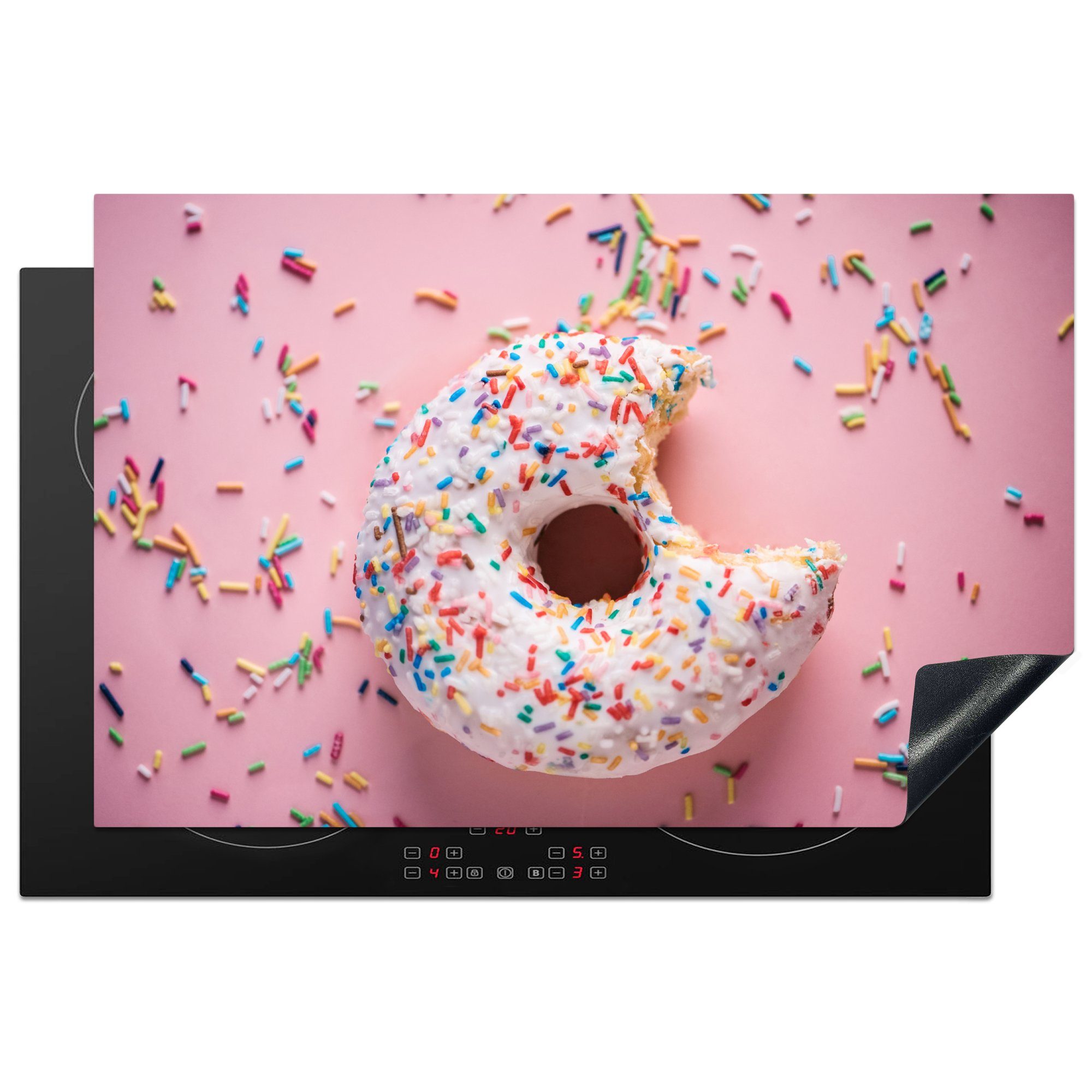 MuchoWow Herdblende-/Abdeckplatte Nahaufnahme eines weißen Donuts mit farbigem Hagel, Vinyl, (1 tlg), 81x52 cm, Induktionskochfeld Schutz für die küche, Ceranfeldabdeckung