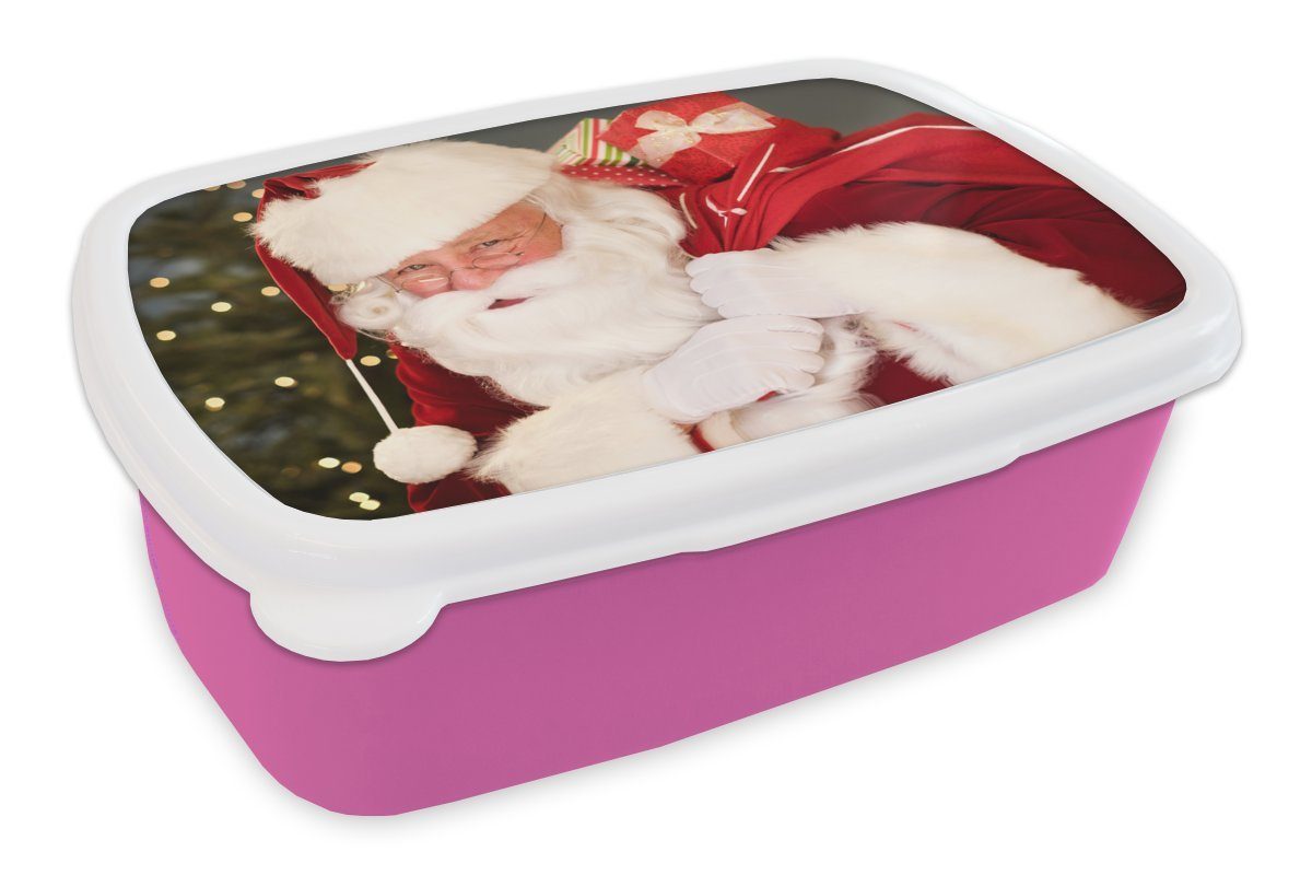 MuchoWow Lunchbox Ein Porträt des Weihnachtsmanns, der einen roten Sack über der, Kunststoff, (2-tlg), Brotbox für Erwachsene, Brotdose Kinder, Snackbox, Mädchen, Kunststoff rosa