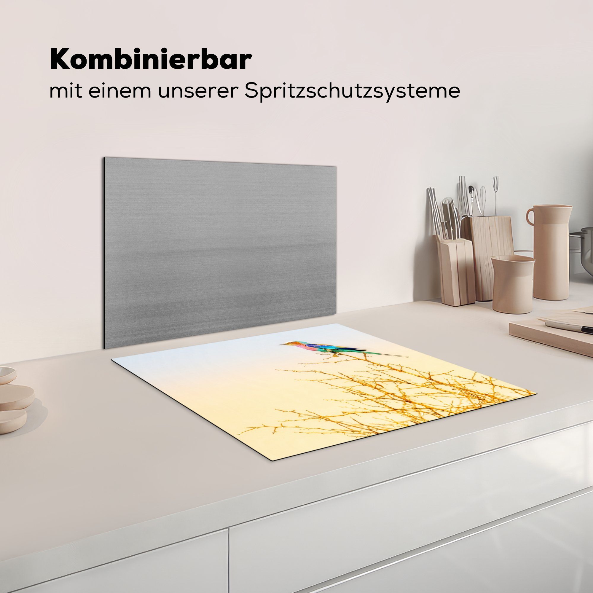 cm, Mobile Arbeitsfläche MuchoWow Ästen kahlen unter nutzbar, Ceranfeldabdeckung tlg), ungewöhnlich Ein Murmeltier 60x52 farbigen, auf Herdblende-/Abdeckplatte (1 Vinyl, einem