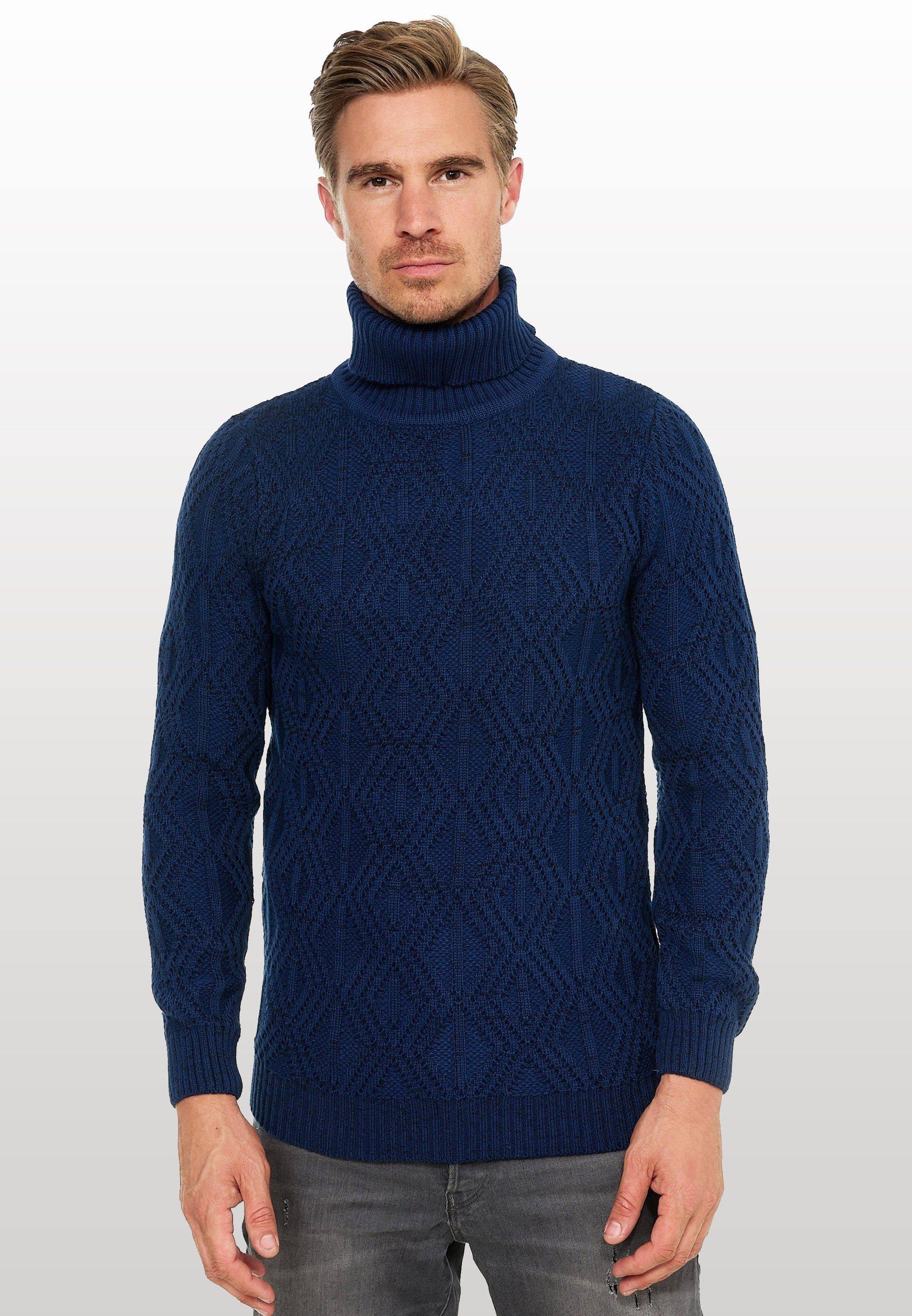 Rusty Neal Rollkragenpullover in modischem Design