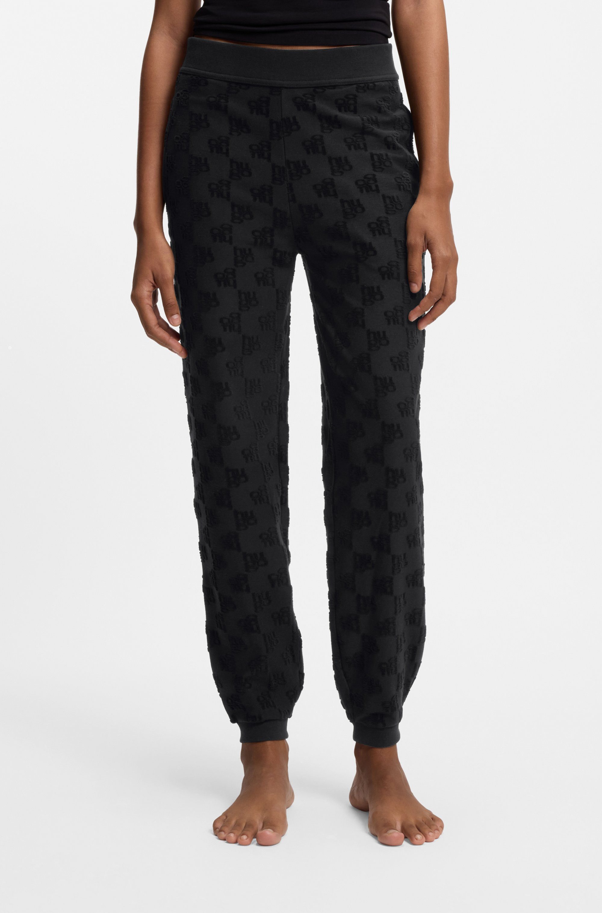 HUGO Jogginghose TERRYMONOGRAM aus Baumwoll-Mix mit Allover-Logo-Muster, el günstig online kaufen