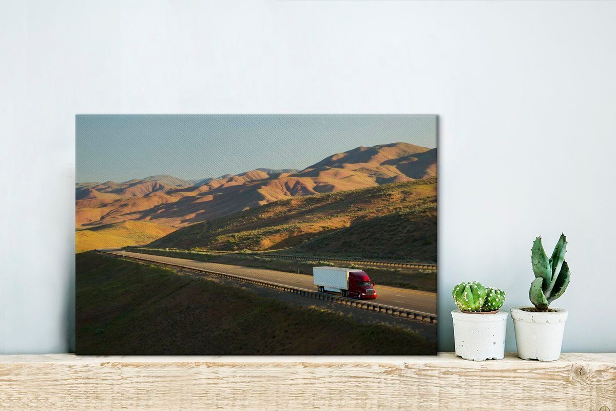 und Aufhängefertig, (1 Gegend, St), Wandbild einer Weißer in Wanddeko, Leinwandbild Leinwandbilder, hügeligen Lastwagen roter OneMillionCanvasses® 30x20 cm