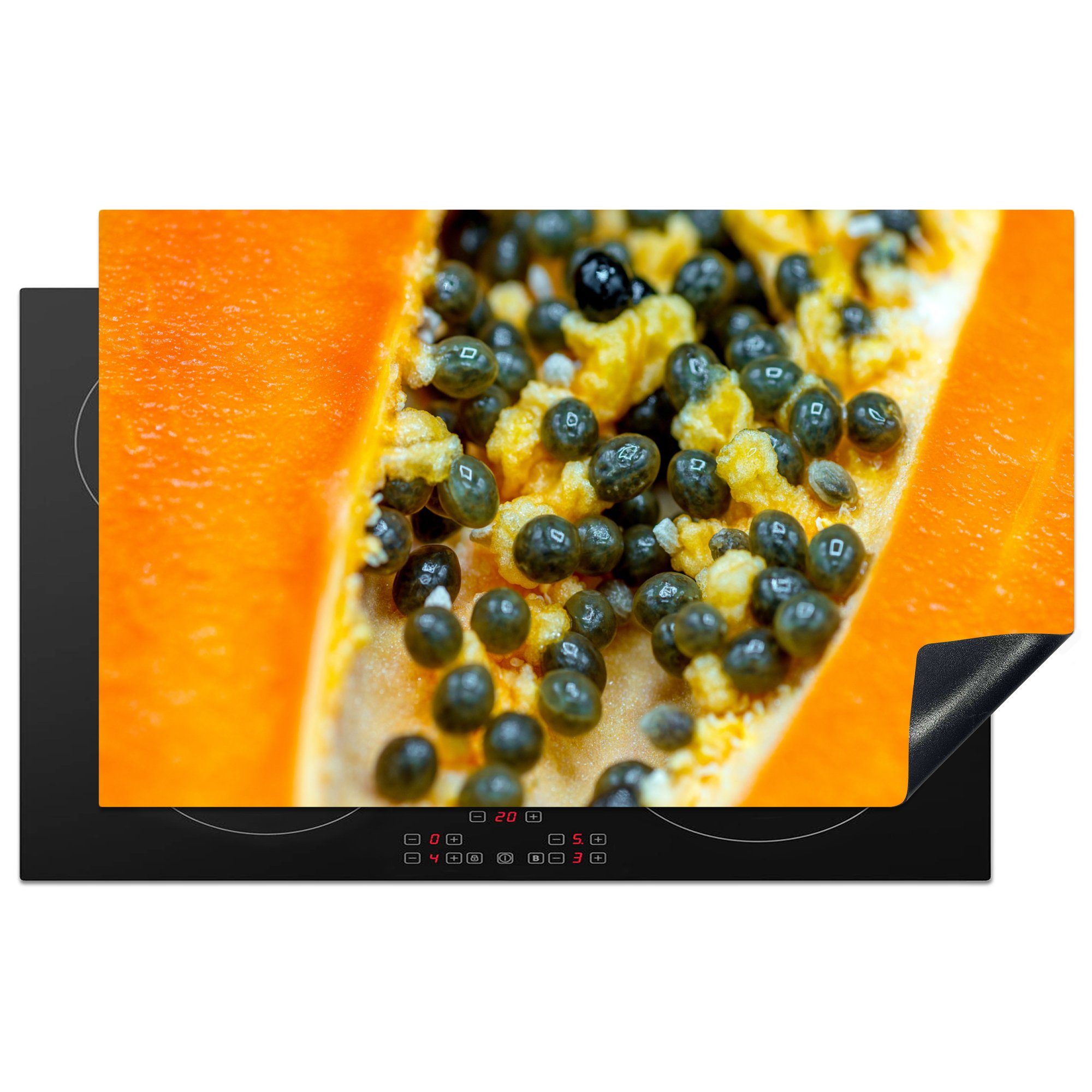 MuchoWow Herdblende-/Abdeckplatte Nahaufnahme der Kerne im Kern einer köstlichen Papaya-Frucht, Vinyl, (1 tlg), 83x51 cm, Ceranfeldabdeckung, Arbeitsplatte für küche