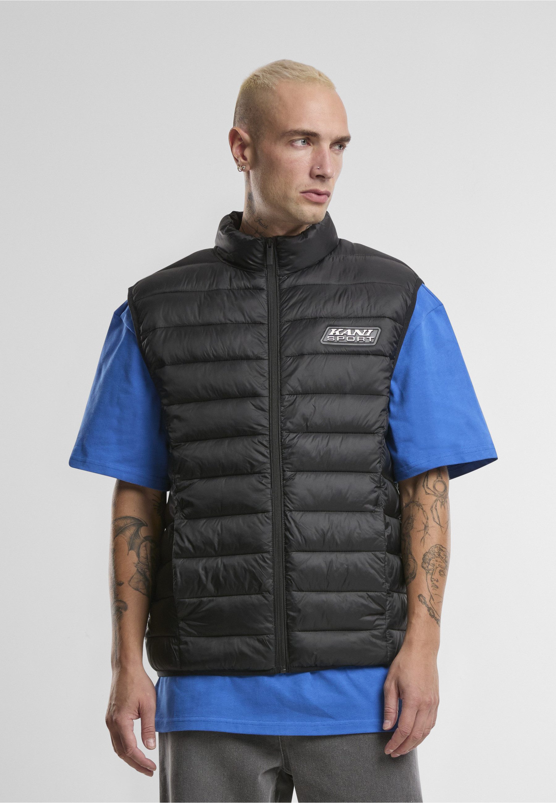 Karl Kani Steppweste Karl Kani Karl Kani Sport Patch Light Puffer Vest (1-tlg)