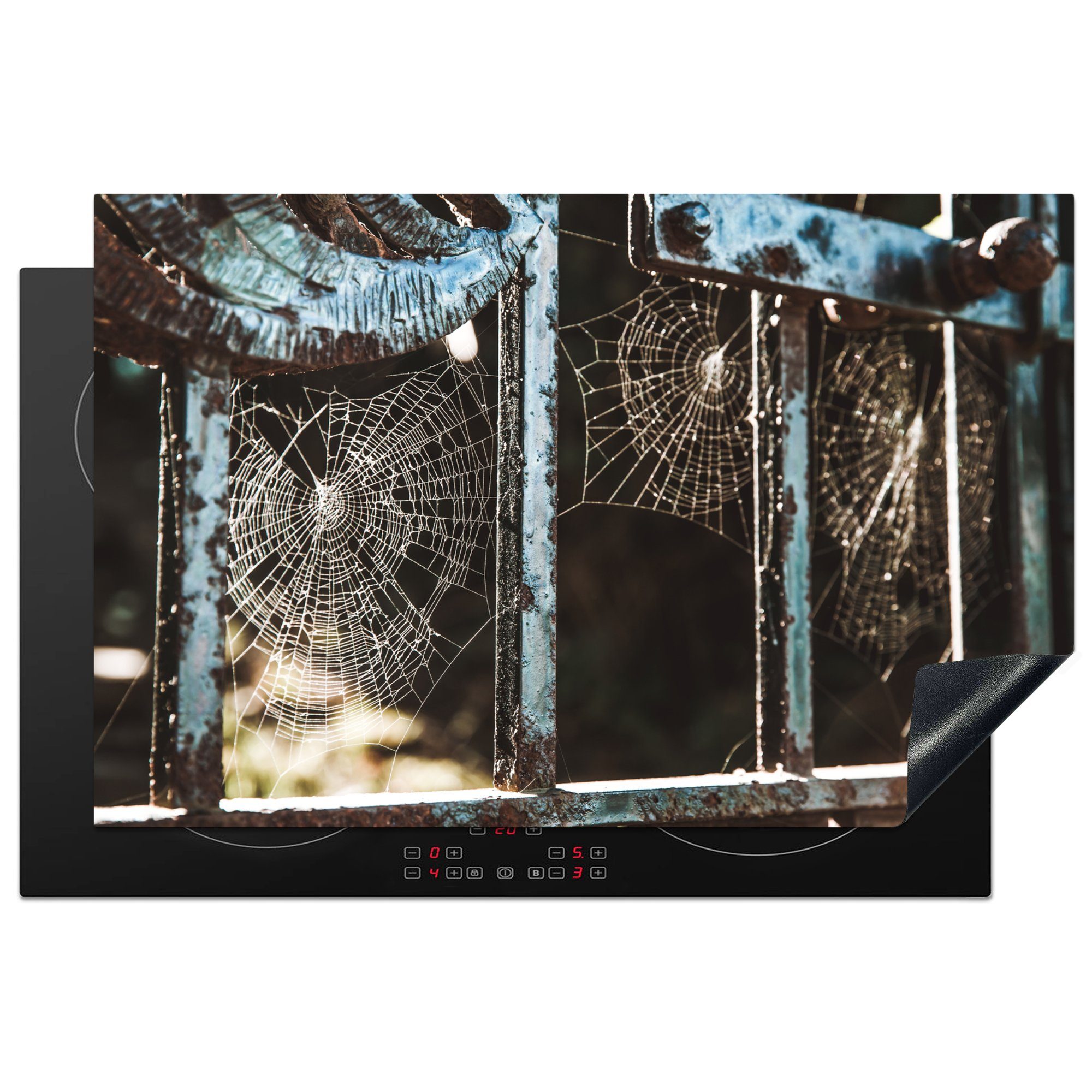 MuchoWow Herdblende-/Abdeckplatte Spinnweben zwischen Metalltoren, Vinyl, (1 tlg), 81x52 cm, Induktionskochfeld Schutz für die küche, Ceranfeldabdeckung
