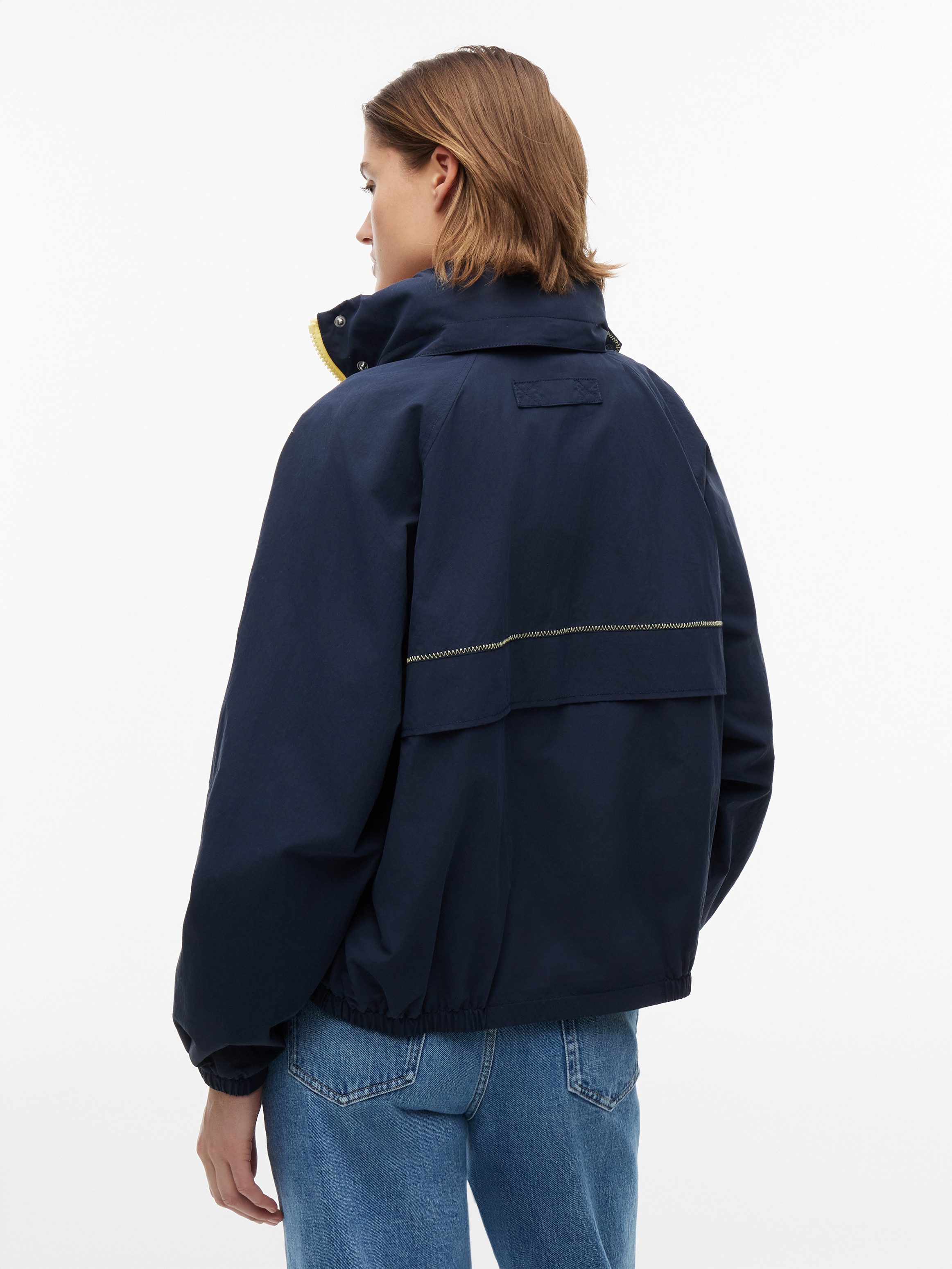 Tommy Jeans Windbreaker TJW COLORBLOCK WINDBREAKER Kunstfaser, elastische Bündchen, verdeckter Reißverschluss