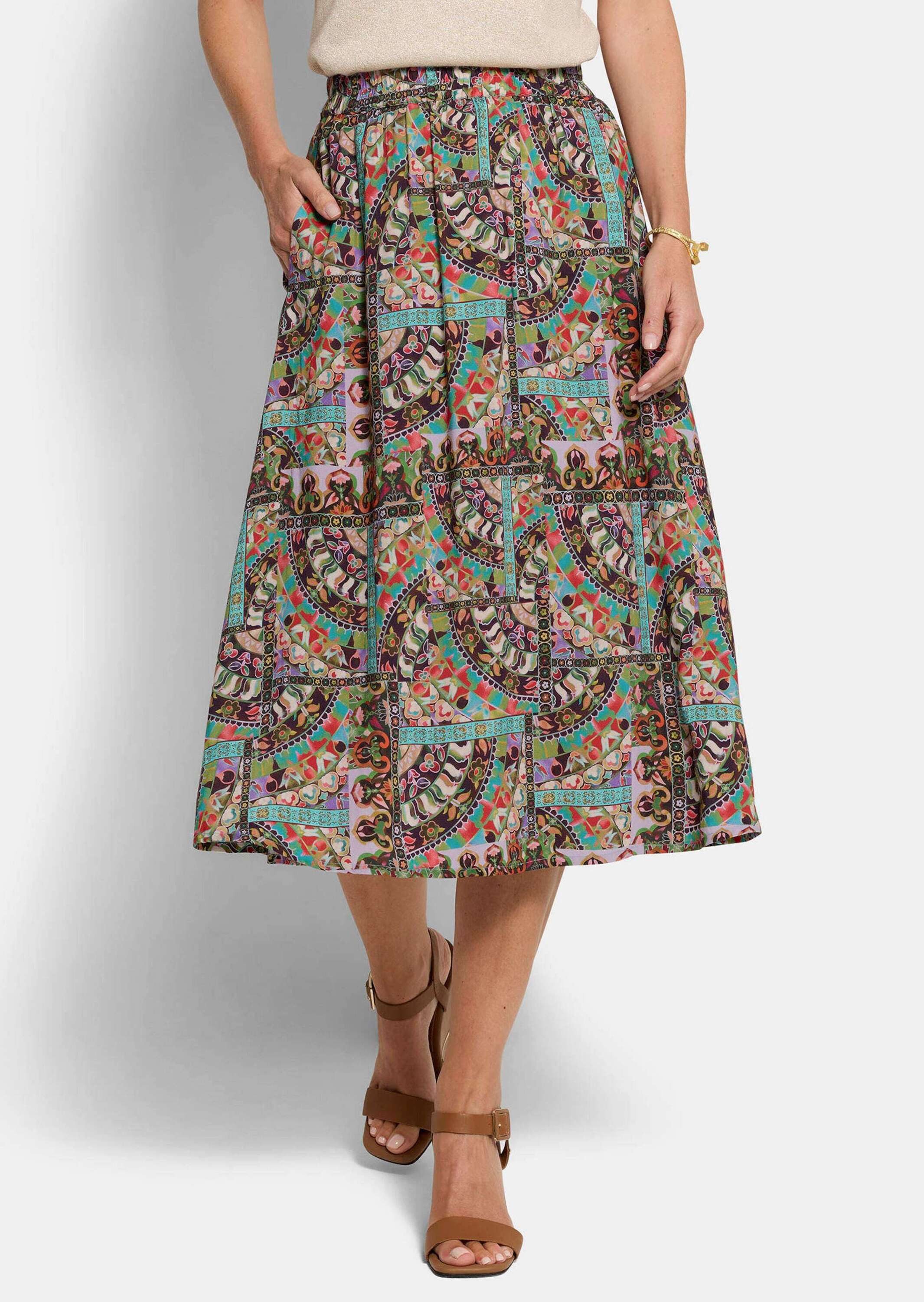 GOLDNER Schlupfrock Kurzgröße: Viskoserock mit Patch-Druck Schlupfrock mit Rundum-Dehnbund, Nahttaschen und Knielänge